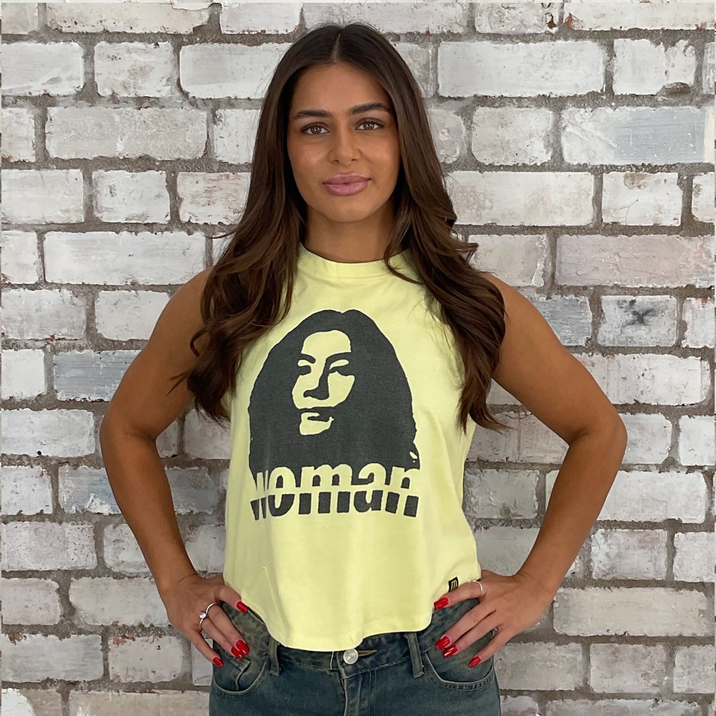Graphic tshirt Yoko Ono upcycled by Unwantees recycled tshirt otherwise destined for landfill. Graphic tshirt recycled into sleeveless vest top, sustainable upcycled fashion, British recycled grunge brand, slow fashion, John Lennon Punk Rock music style graphic tshirt upcycled by Unwantees, Racerback tank top, upcycled in the UK by unwantees. Sustainable upcycled fashion