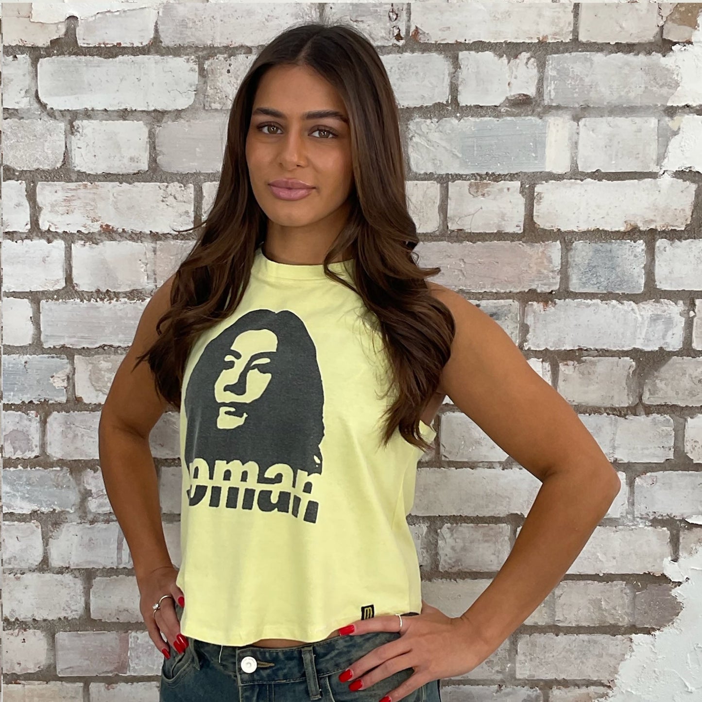 Woman, Yoko Ono Graphic tshirt upcycled by Unwantees recycled tshirt otherwise destined for landfill. Graphic tshirt recycled into sleeveless vest top, sustainable upcycled fashion, British recycled grunge brand, slow fashion, John Lennon Punk Rock music style graphic tshirt upcycled by Unwantees, Racerback tank top, upcycled in the UK by unwantees. Sustainable upcycled fashion