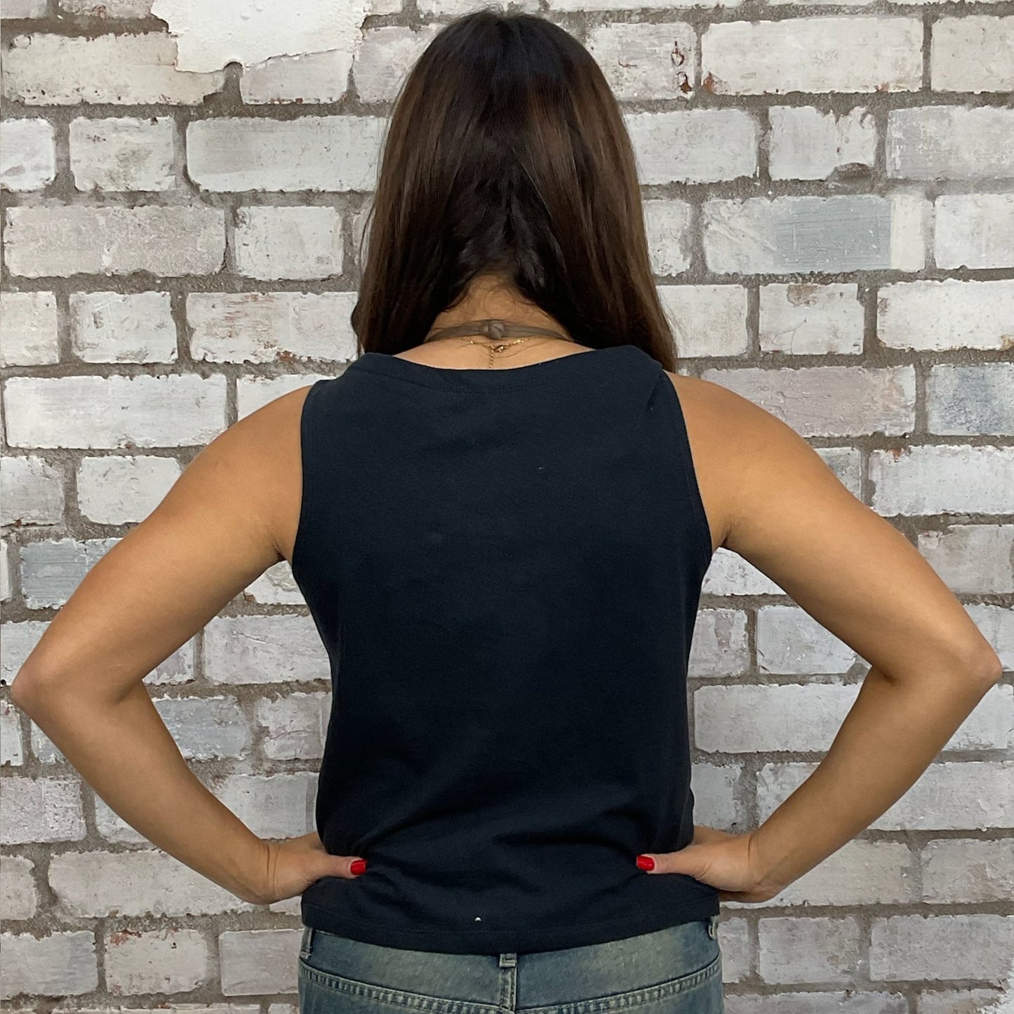 Rolling Stones Exhibitionism tour band tshirt recycled into sleeveless Slash Neck vest top, sustainable upcycled fashion, British recycled grunge brand, slow fashion, Punk Rock music style graphic tshirt upcycled by Unwantees, Rock and Roll all Night Tour tshirt upcycled in the UK by unwantees. Sustainable upcycled fashion. Graphic tshirt upcycled by Unwantees recycled tshirt otherwise destined for landfill.