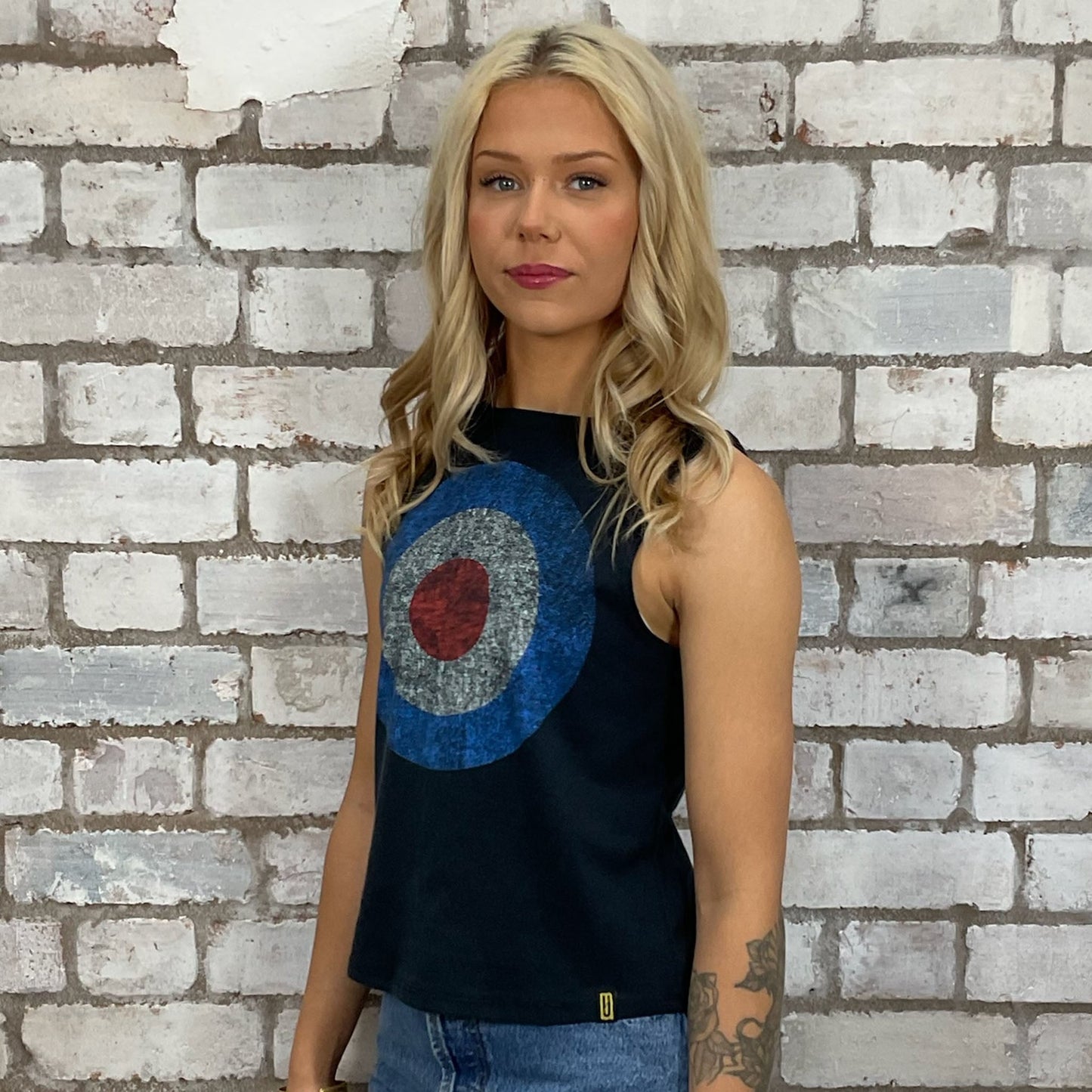 The Who, Lambretta tshirt recycled into sleeveless Slash Neck vest top, sustainable upcycled fashion, British recycled grunge brand, slow fashion, Punk Rock music style graphic tshirt upcycled by Unwantees, Mods and Rockers tshirt upcycled in the UK by unwantees. Sustainable upcycled fashion. Graphic tshirt upcycled by Unwantees recycled tshirt otherwise destined for landfill.