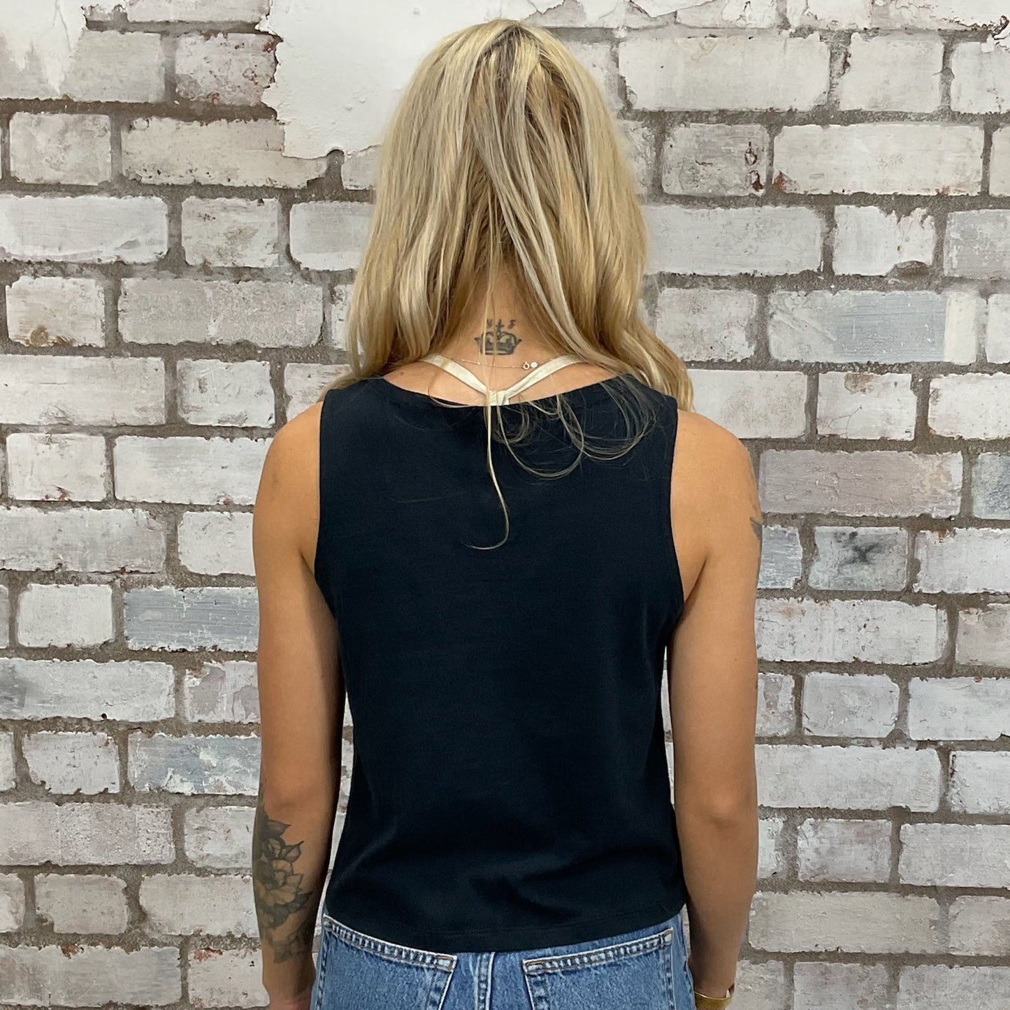 Lambretta tshirt recycled into sleeveless Slash Neck vest top, sustainable upcycled fashion, British recycled grunge brand, slow fashion, Punk Rock music style graphic tshirt upcycled by Unwantees, The Who, Mods and Rockers tshirt upcycled in the UK by unwantees. Sustainable upcycled fashion. Graphic tshirt upcycled by Unwantees recycled tshirt otherwise destined for landfill.