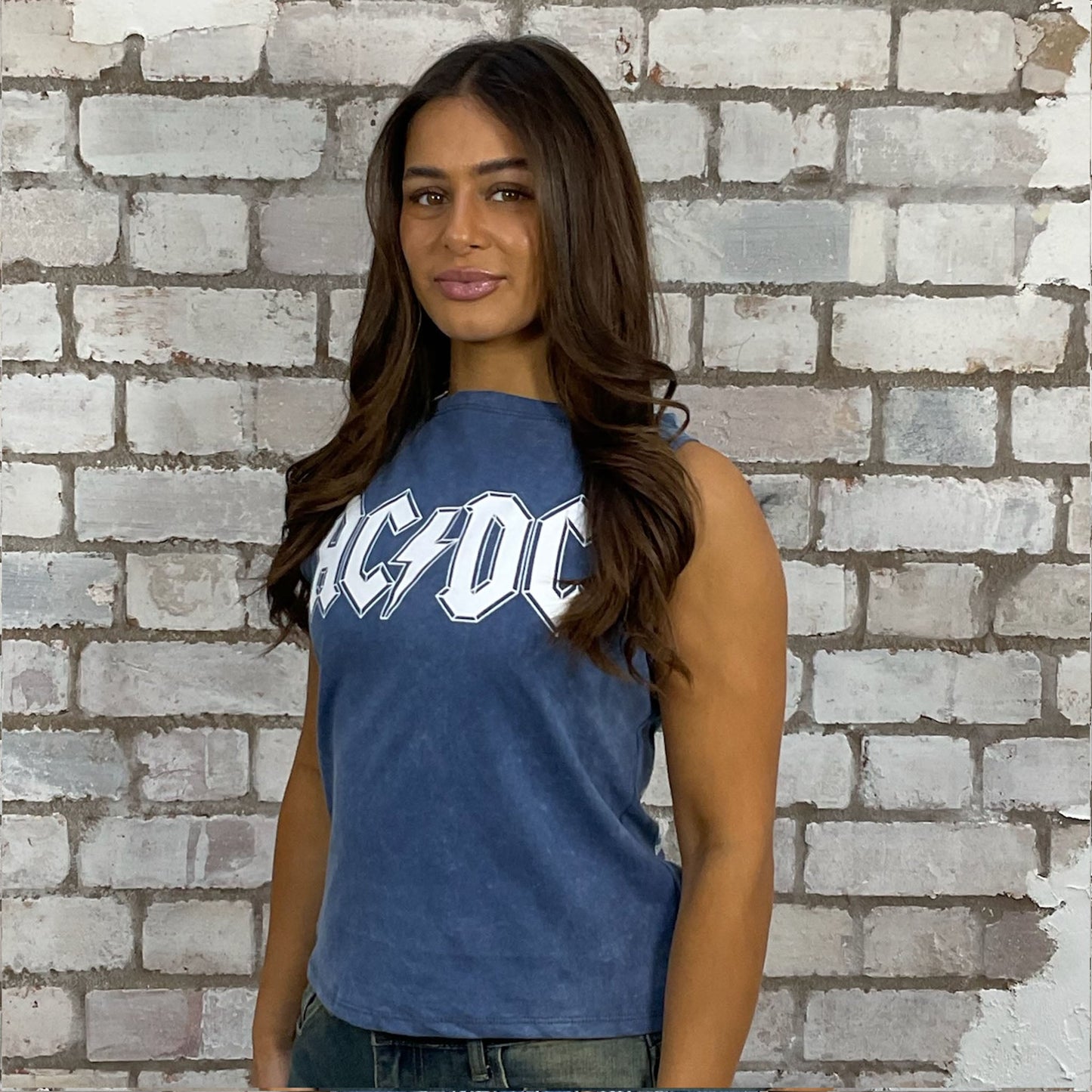 AC/DC Band tshirt recycled into sleeveless vest top, sustainable upcycled fashion, British recycled fashion brand, slow fashion, eco conscious fashion graphic tshirt upcycled by Unwantees, recycled tshirt otherwise destined for landfill. Rock music style graphic tshirt upcycled by Unwantees, Slash Neck tank top, upcycled in the UK by unwantees. Sustainable upcycled fashion