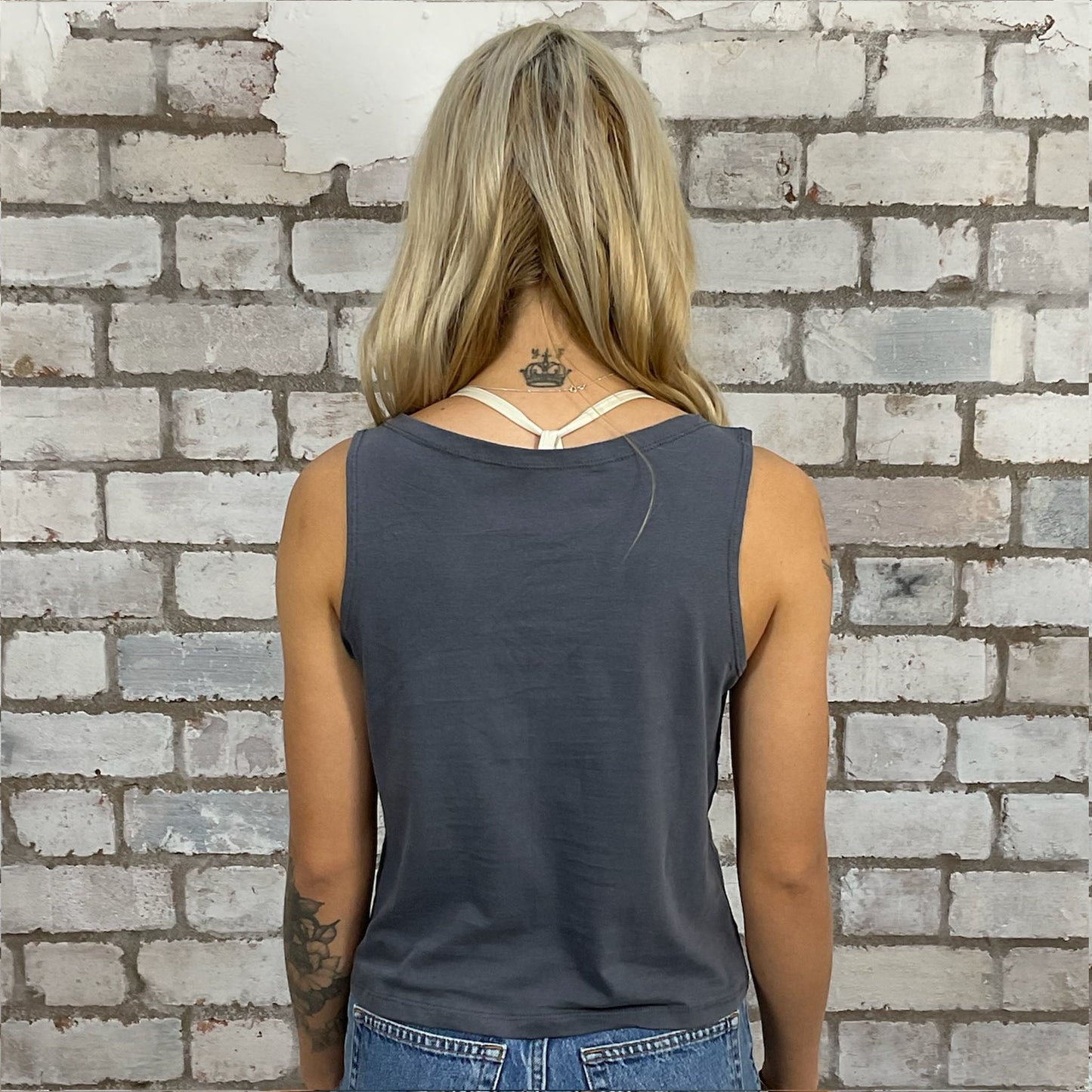 Queen Band tshirt recycled into sleeveless vest top, sustainable upcycled fashion, British recycled fashion brand, slow fashion, eco conscious fashion graphic tshirt upcycled by Unwantees, recycled tshirt otherwise destined for landfill. Rock music style graphic tshirt upcycled by Unwantees, Slash Neck tank top, upcycled in the UK by unwantees. Sustainable upcycled fashion