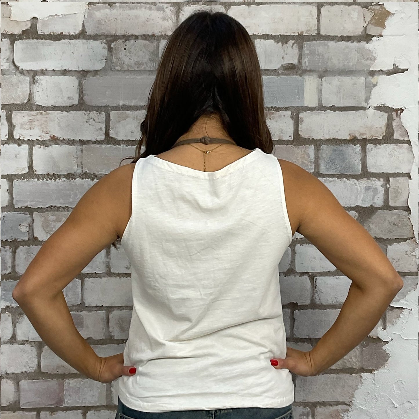 Beatles Band white tshirt recycled into sleeveless vest top, sustainable upcycled fashion, British recycled fashion brand, slow fashion, eco conscious fashion graphic tshirt upcycled by Unwantees, recycled tshirt otherwise destined for landfill. Rock music style graphic tshirt upcycled by Unwantees, Slash Neck tank top, upcycled in the UK by unwantees. Sustainable upcycled fashion