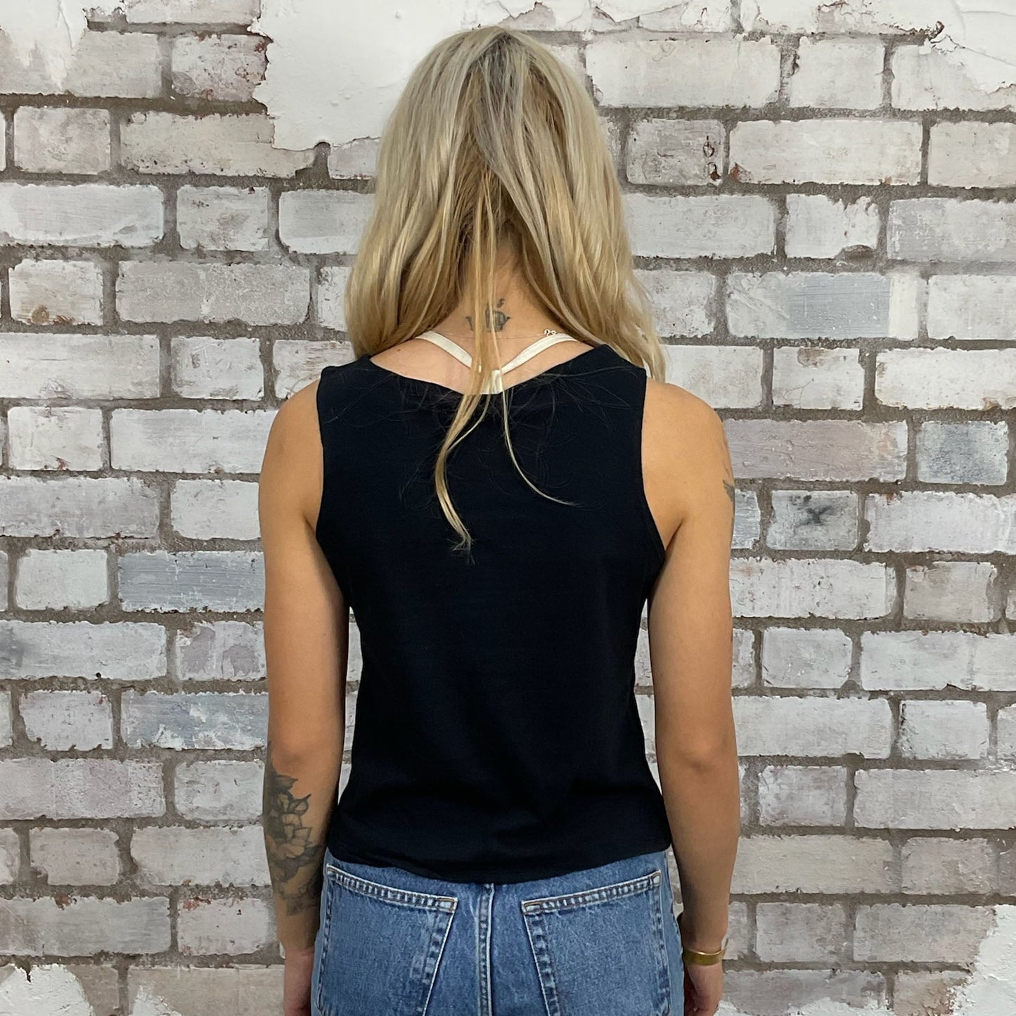 The Foo Fighters Learn to Fly graphic tshirt recycled into sleeveless vest top, sustainable upcycled fashion, British recycled fashion brand, slow fashion, eco conscious band graphic tshirt upcycled by Unwantees, recycled tshirt otherwise destined for landfill. Rock music style graphic tshirt upcycled by Unwantees, Slash Neck tank top, upcycled in the UK by unwantees. Sustainable upcycled fashion