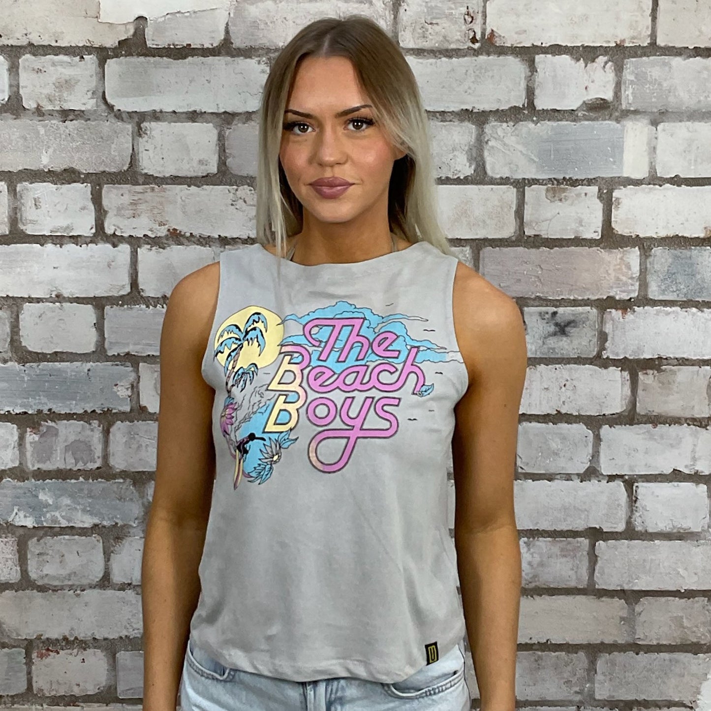 Beach Boys graphic tshirt recycled into sleeveless vest top, sustainable upcycled fashion, British recycled fashion brand, slow fashion, eco conscious band graphic tshirt upcycled by Unwantees, recycled tshirt otherwise destined for landfill. Rock music style graphic tshirt upcycled by Unwantees, Slash Neck tank top, upcycled in the UK by unwantees. Sustainable upcycled fashion