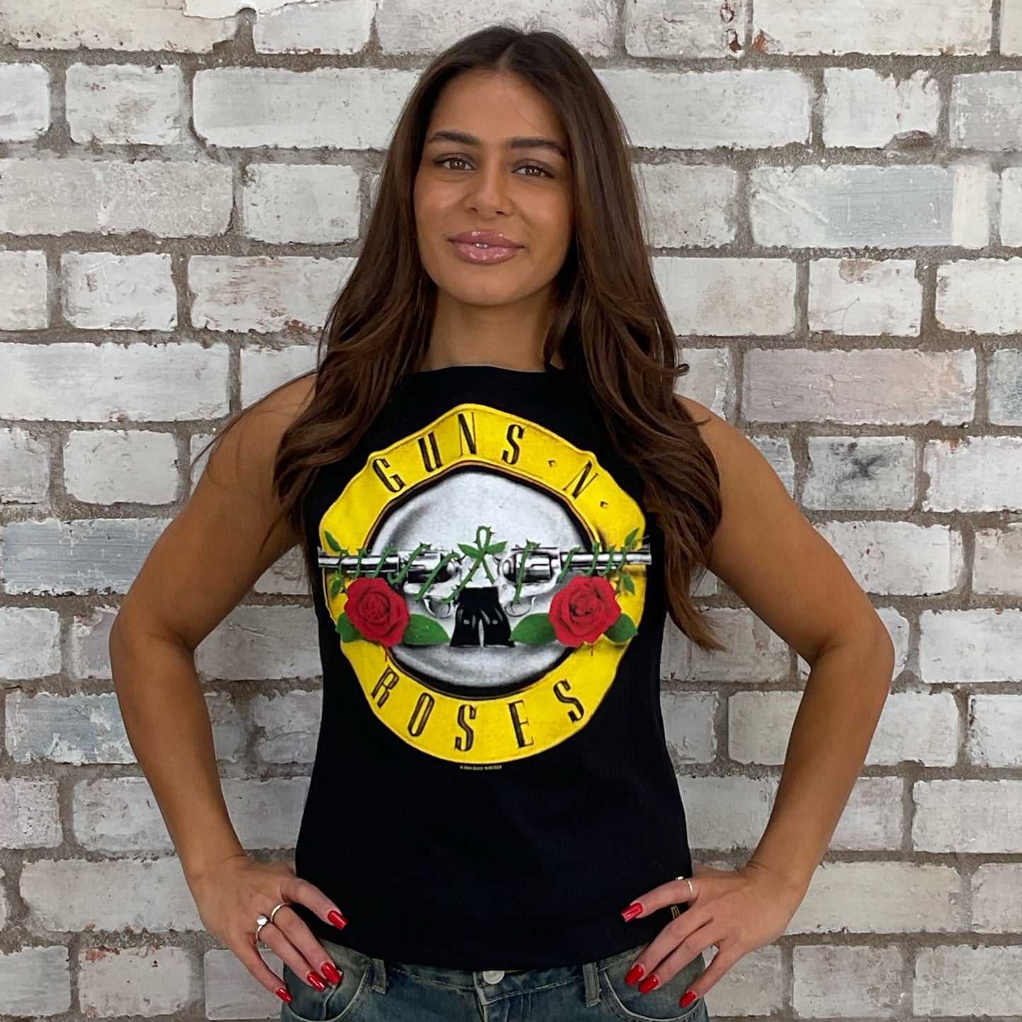 Guns N Roses emblem graphic tshirt recycled into sleeveless vest top, sustainable upcycled fashion, British recycled fashion brand, slow fashion, eco conscious band graphic tshirt upcycled by Unwantees, recycled tshirt otherwise destined for landfill. Rock music style graphic tshirt upcycled by Unwantees, Grey Slash Neck tank top, upcycled in the UK by unwantees. Sustainable upcycled fashion