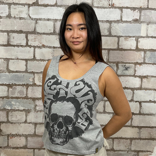 Fenchurch Skate brand Tshirt Upcycled by Unwantees, made from upcycled and deconstructed graphic tshirt, punk rock style street wear, athleisure wear, unwantees is a sustainable fashion brand, we take unwanted graphic tshirts otherwise destined for landfill and recycle clothing into vest tops for sports wear or leisure. Refashioned band merch, Slash Neck Sleeveless Top