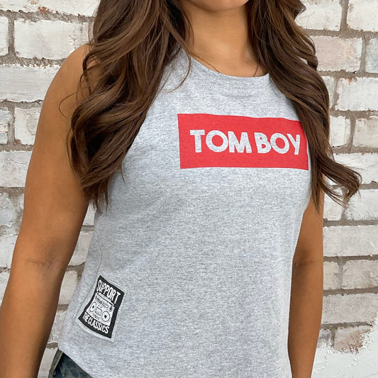 Tomboy print grey tshirt recycled into sleeveless vest top, sustainable upcycled fashion, British recycled fashion brand Social Recluse Hundred club, slow fashion, eco conscious band graphic tshirt upcycled by Unwantees, recycled tshirt otherwise destined for landfill. Rock music style graphic tshirt upcycled by Unwantees, Grey Racerback tank top, upcycled in the UK by unwantees. Sustainable upcycled fashion