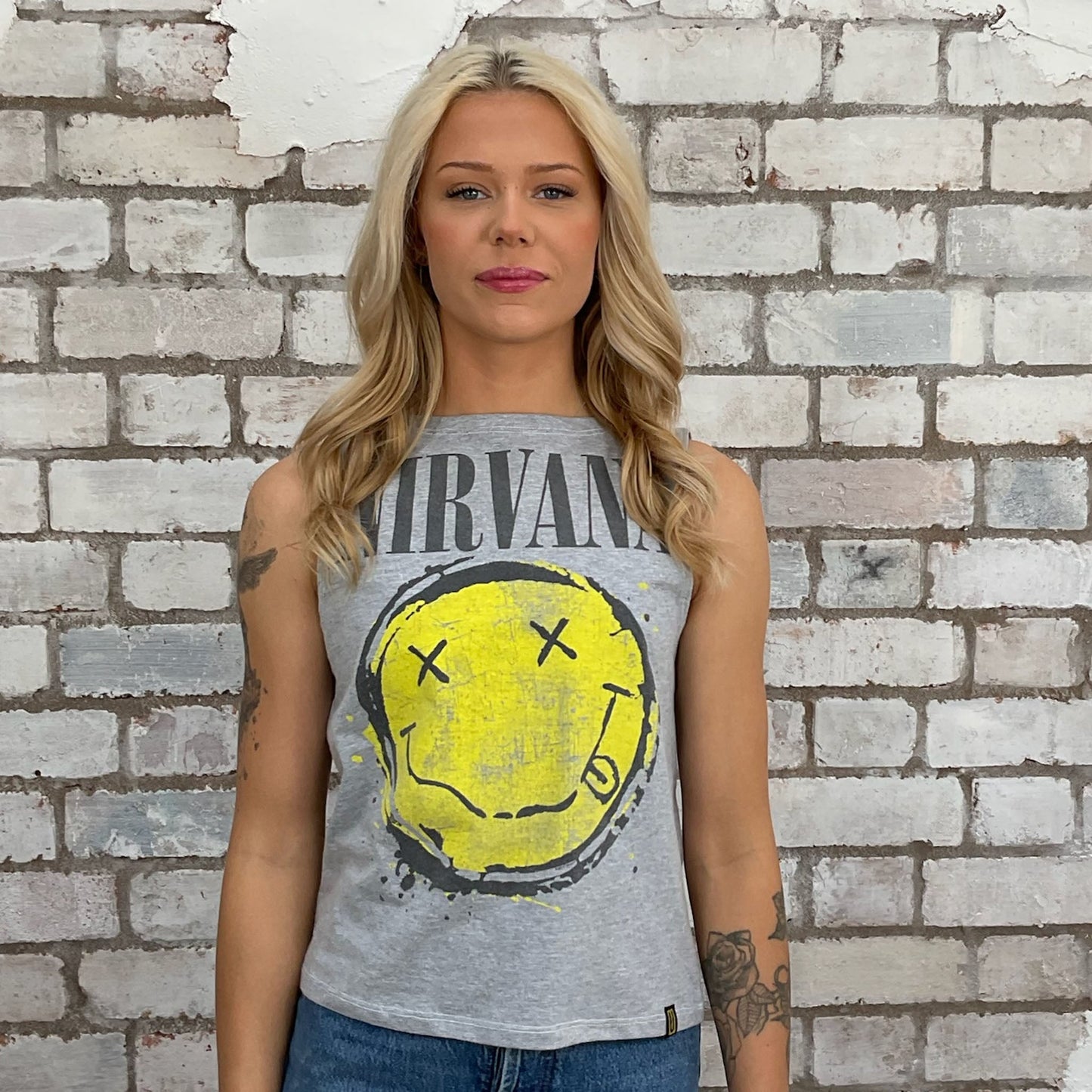 Nirvana Acid face Print Slash neck tank top made from an upcycled grey graphic band tshirt, punk rock style street wear, athleisure wear, unwantees is a sustainable fashion brand, we take unwanted graphic tshirts otherwise destined for landfill and recycle clothing into vest tops for sports wear or leisure. Refashioned band merch, Slash Neck Sleeveless Top