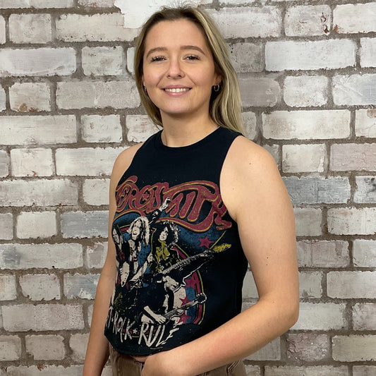 Aerosmith Let Rock Rule Tour tshirt, graphic print Tshirt Upcycled by Unwantees, Graphic print on black Tshirt jersey fabric, Festival Style Unwantee made from upcycled and deconstructed graphic tshirt, athleisure wear, unwantees is a sustainable fashion brand, we take unwanted graphic tshirts otherwise destined for landfill and recycle clothing into vest tops for sports wear or leisure. Refashioned band merch, Slash Neck Sleeveless Top