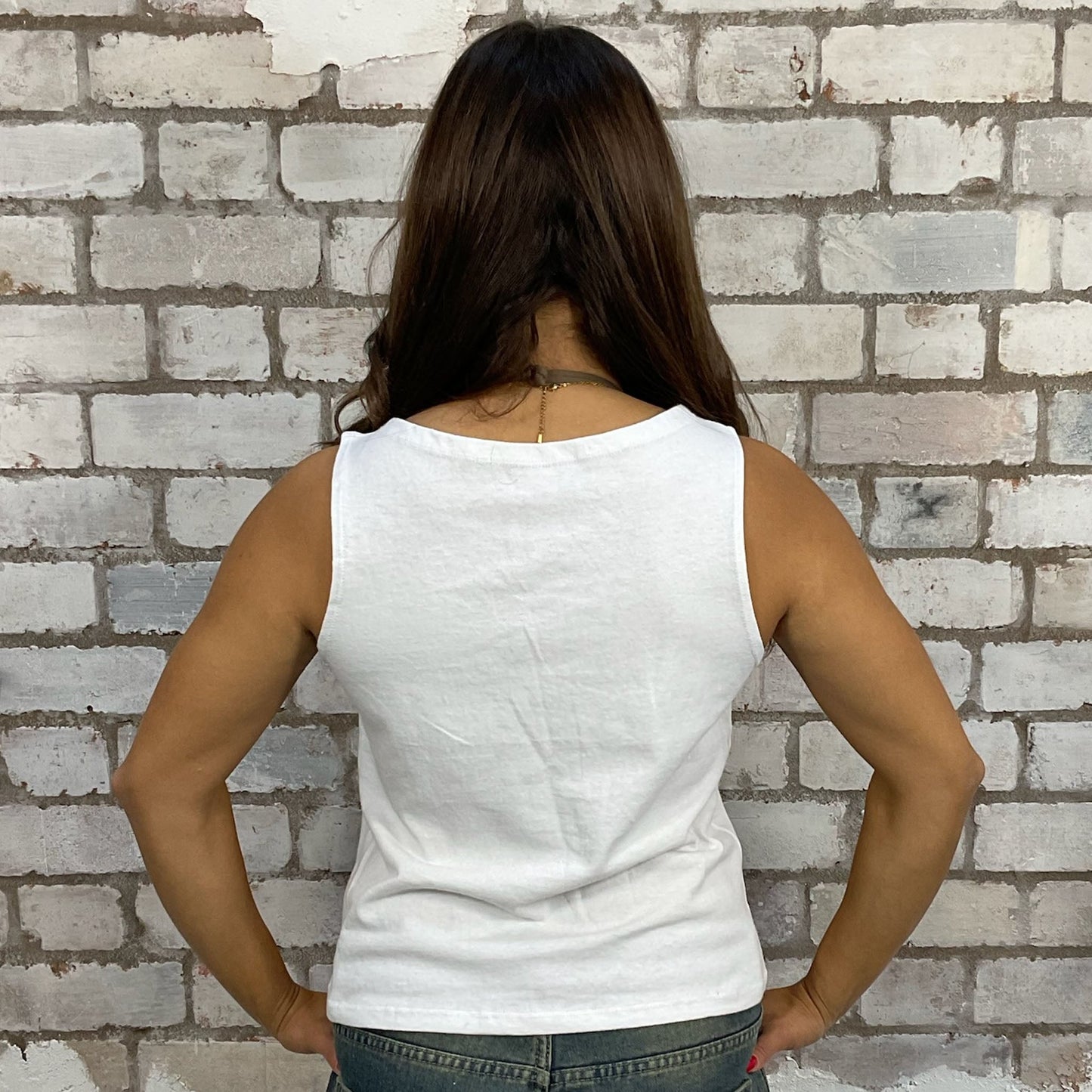 slash neck Nirvana print white tank top made from an upcycled graphic band tshirt, punk rock style street wear, athleisure wear, unwantees is a sustainable fashion brand, we take unwanted Y2K graphic tshirts otherwise destined for landfill and recycle clothing into vest tops for sports wear or leisure. Refashioned band merch, Sleeveless Top