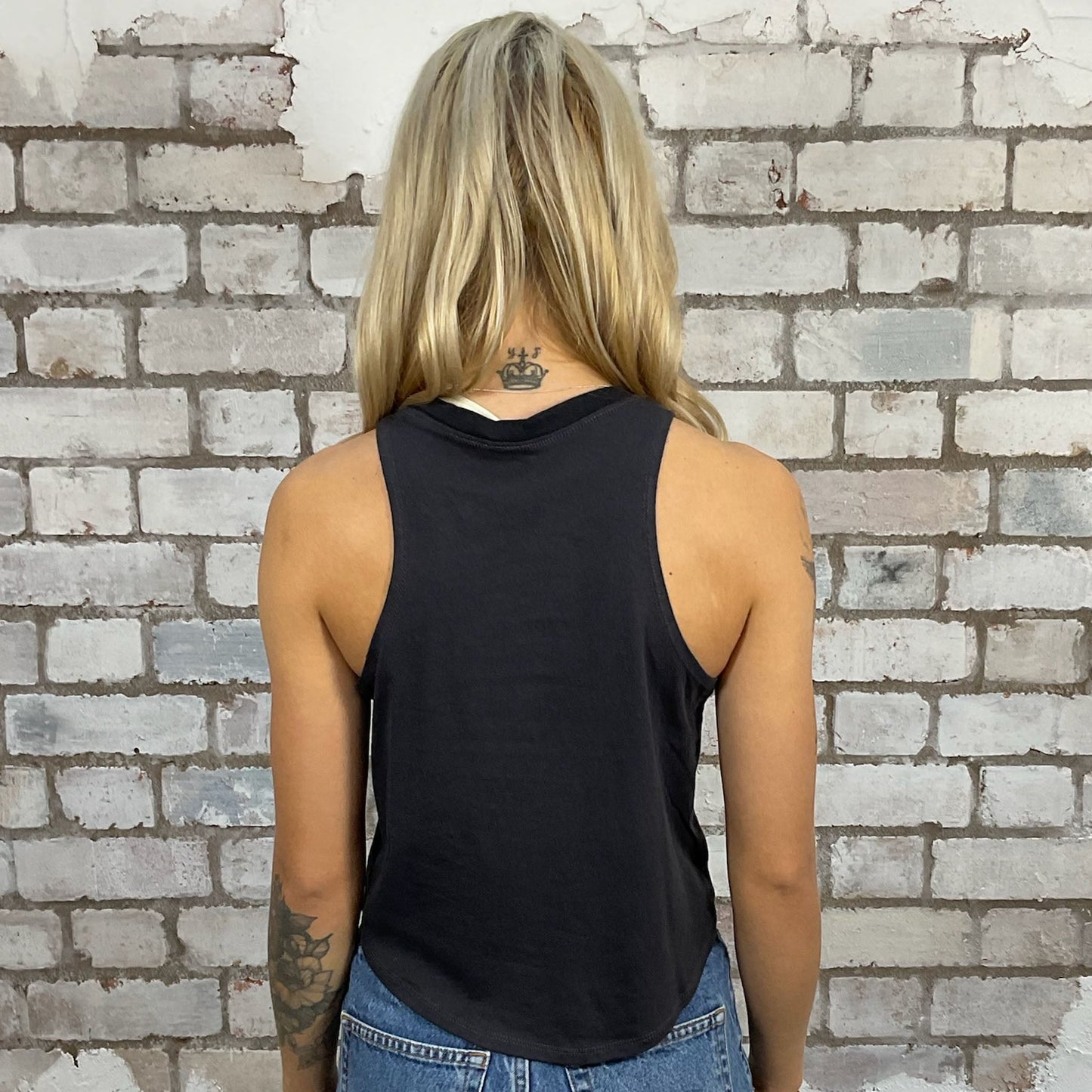 Racerback vest top with Fleetwood Mac white print on a grey tank top made from an upcycled graphic band tshirt, punk rock style street wear, athleisure wear, unwantees is a sustainable fashion brand, we take unwanted Y2K graphic tshirts otherwise destined for landfill and recycle clothing into vest tops for sports wear or leisure. Refashioned band merch, Sleeveless Top