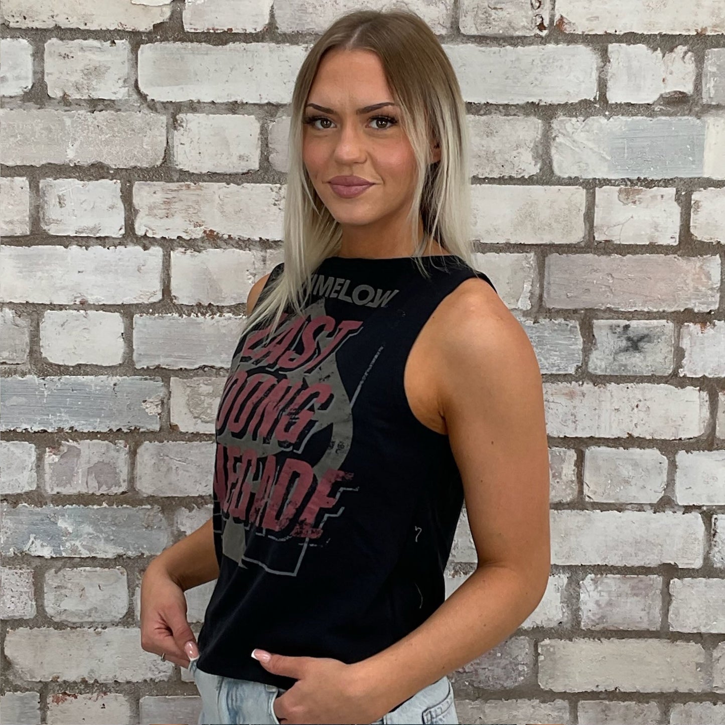 Last Young Renegade All Time Low Print Slash neck tank top made from upcycled graphic band tshirt, punk rock style street wear, athleisure wear, unwantees is a sustainable fashion brand, we take unwanted graphic tshirts otherwise destined for landfill and recycle clothing into vest tops for sports wear or leisure. Refashioned band merch, Slash Neck Sleeveless Top