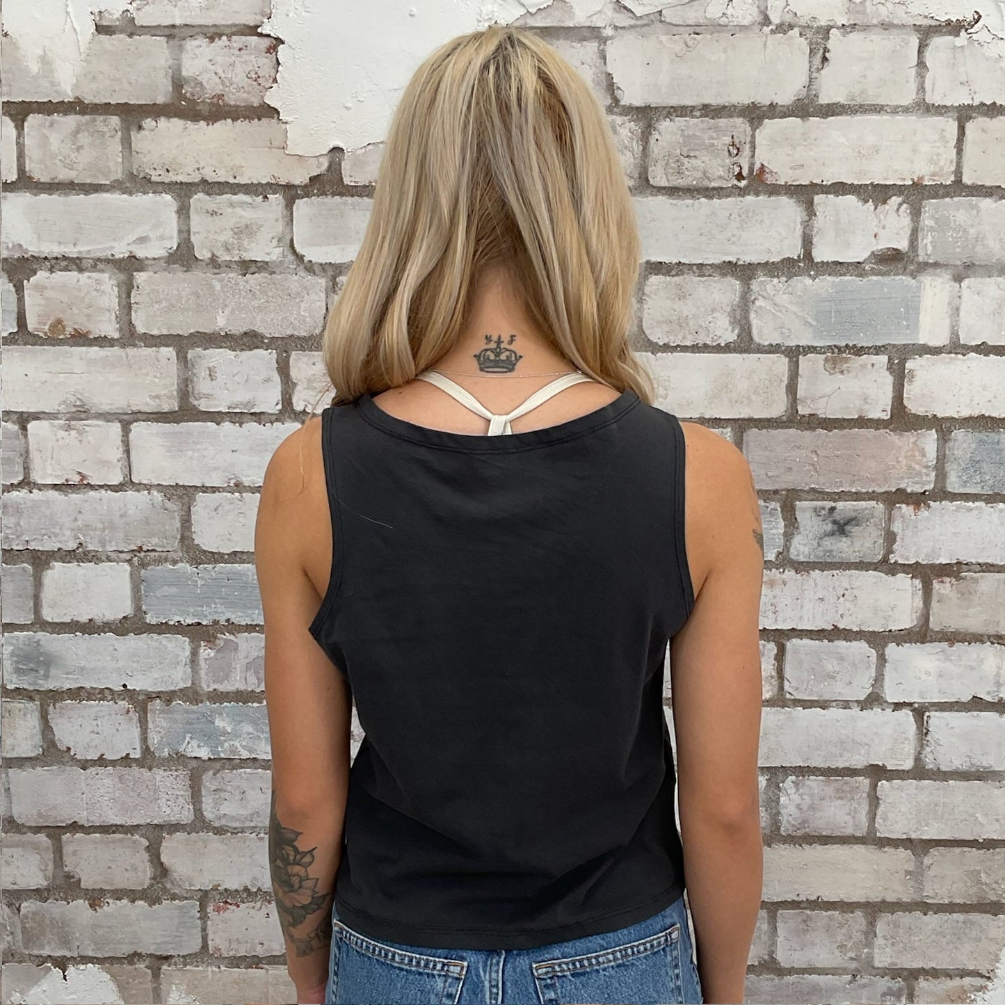 Foo Fighters print on black Slash neck tank top made from upcycled graphic band tshirt, punk rock style street wear, athleisure wear, unwantees is a sustainable fashion brand, we take unwanted graphic tshirts otherwise destined for landfill and recycle clothing into vest tops for sports wear or leisure. Refashioned band merch, Slash Neck Sleeveless Top