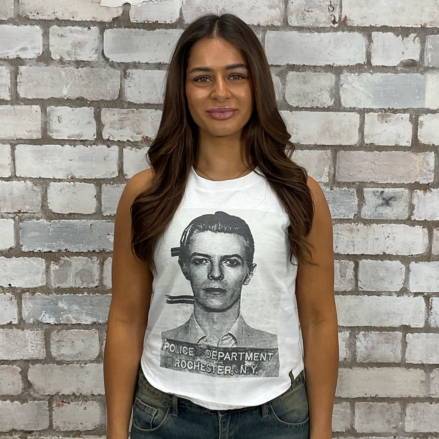 David Bowie famous mugshot graphic tshirt upcycled by Unwantees, recycled tshirt otherwise destined for landfill. Rock and Roll graphic tshirt upcycled by Unwantees, racerback tank top, upcycled in the UK by unwantees. Sustainable upcycled fashion, rock Music Style, sleeveless tank top, sustainable upcycled fashion, British recycled fashion brand, slow fashion, eco conscious fashion