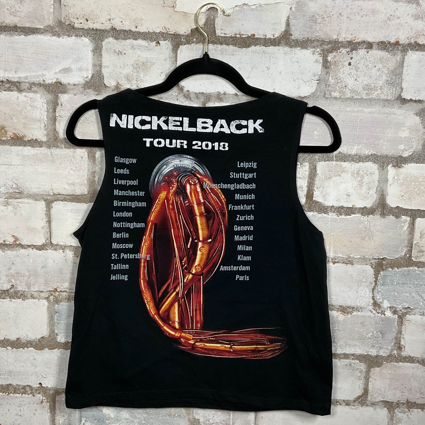 Rear View of Nickleback Feed the machine 2018 graphics on black cotton Racerback Tank Top upcycled by Unwantees, sustainable fashion made in Great Britain from vintage graphic tshirt
