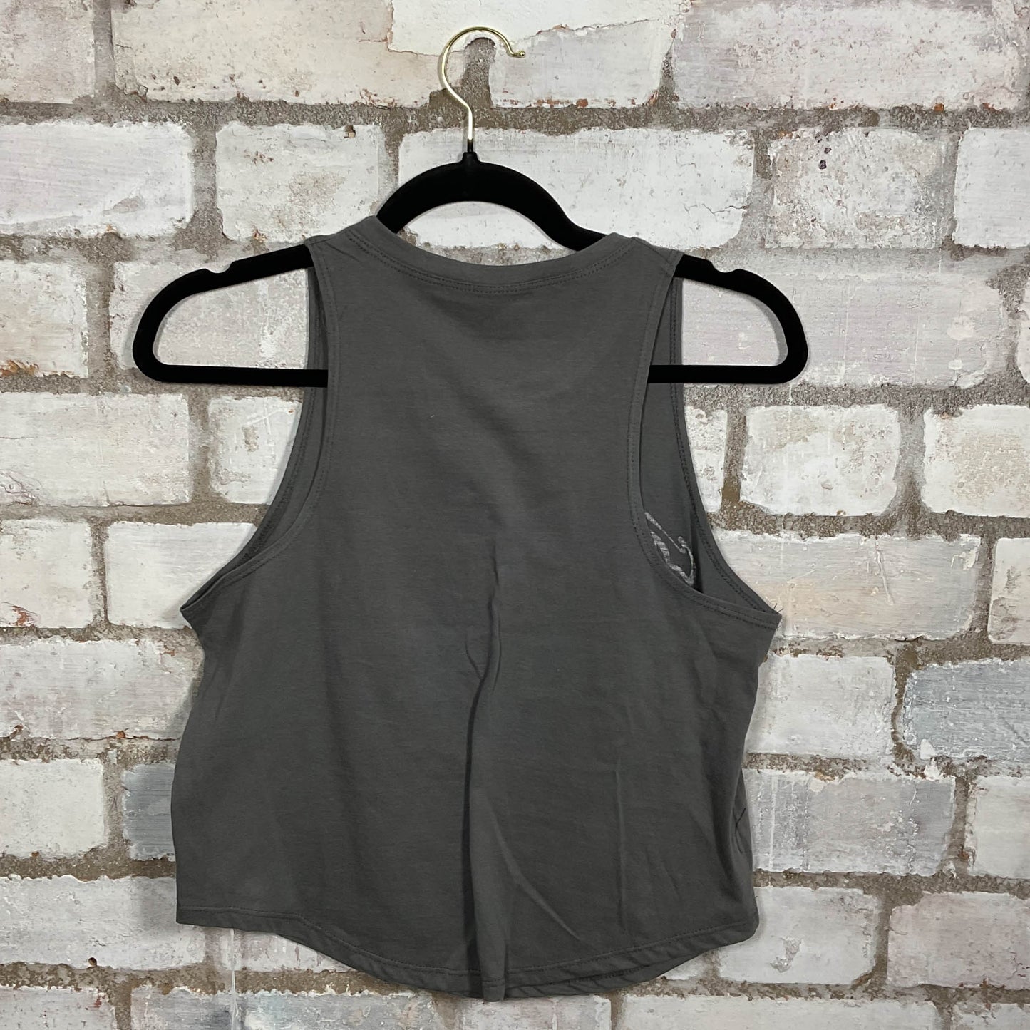 Rear view of Aerosmith Get Your Wings US Tour ‘74 Tour Vintage Double Sided Tshirt merch graphics on grey cotton Racerback Tank Top upcycled by Unwantees, sustainable fashion made in Great Britain from vintage graphic tshirt