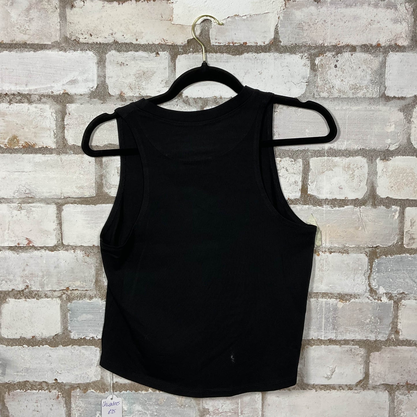 Rear view of Be You Rainbow Print on a black Racerback Tank Top upcycled by Unwantees, sustainable fashion made in great Britain from vintage graphic tshirt