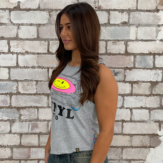 1980s theme vinyl graphic tshirt upcycled by Unwantees, eco conscious fashion graphic tshirt upcycled by Unwantees, recycled tshirt otherwise destined for landfill. Graphic tshirt recycled into sleeveless vest top, sustainable upcycled fashion, British recycled grunge brand, slow fashion, Punk Rock Acid House music style graphic tshirt upcycled by Unwantees, Racerback tank top, upcycled in the UK by unwantees. Sustainable upcycled fashion