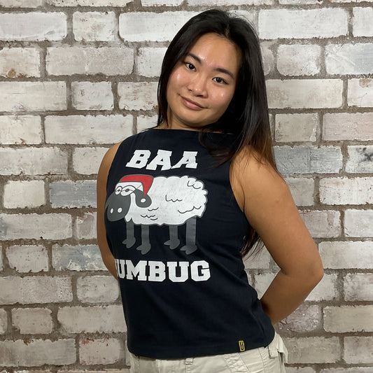 Christmas tank top made from upcycled Christmas graphic print tshirt. An upcycle by Unwantees. Made in the UK, Sustainable fashion, streetwear, Th Christmas Sweater alternative