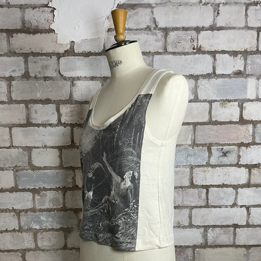 Mannequin wearing a tank top with a brick wall background, Lord Huron band tshirt upcycled by Unwantees, recycled Lord Huron band top into vest top, slow fashion, sustainable fashion UK eco-friendly clothing UK upcycled t-shirts / upcycled tank tops ethical fashion brand UK zero waste clothi, Unwantees