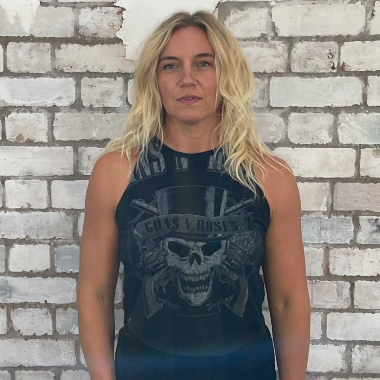 One-of-a-kind Guns N’ Roses Skull in Top Hat graphic Racerback Unwantee tank top front view, upcycled, sustainable, made in Britain