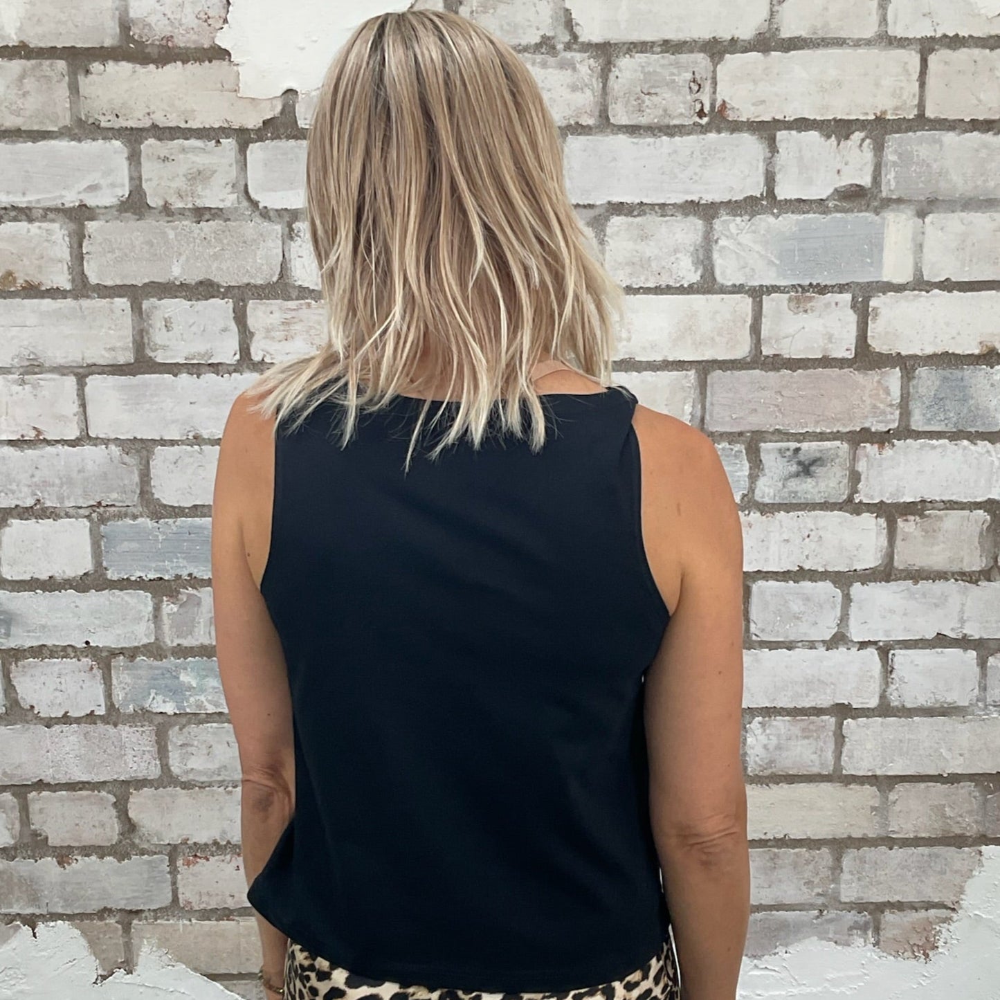 One-of-a-kind Jimi Hendrix Plays Copenhagen 1970 graphic Slash Neck Unwantee tank top back view, upcycled, sustainable, made in Britain