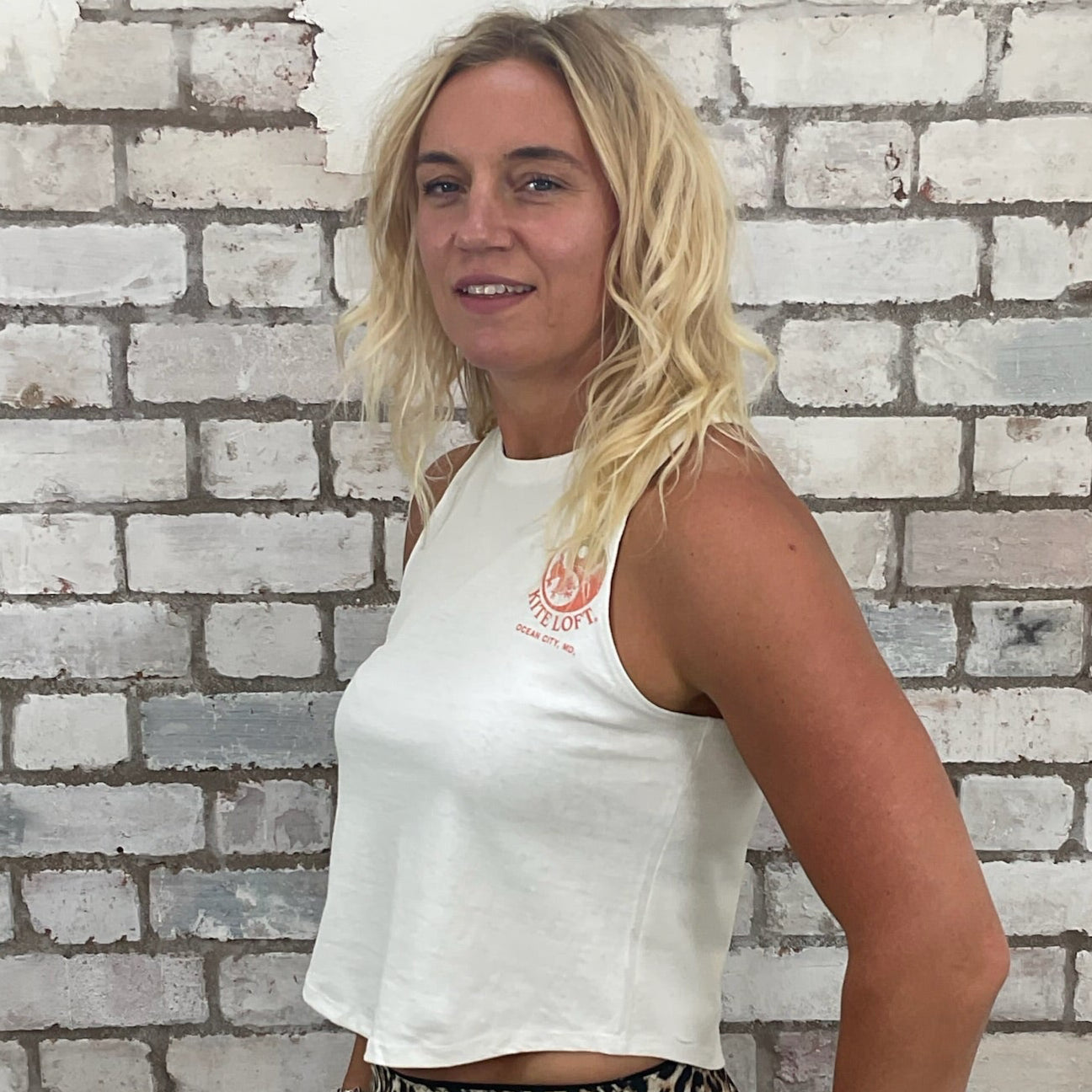 One-of-a-kind The Kite Loft graphic Racerback Unwantee tank top side view, upcycled, sustainable, made in Britain