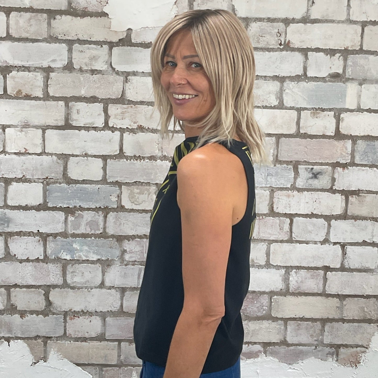 One-of-a-kind Nirvana Acid Face Yellow Print graphic Slash Neck Unwantee tank top side view, upcycled, sustainable, made in Britain