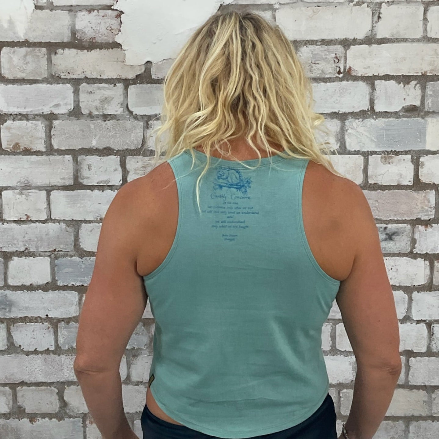 One-of-a-kind The Rhythm of the Earth original 80s illustration graphic Racerback Unwantee tank top back view, upcycled, sustainable, made in Britain