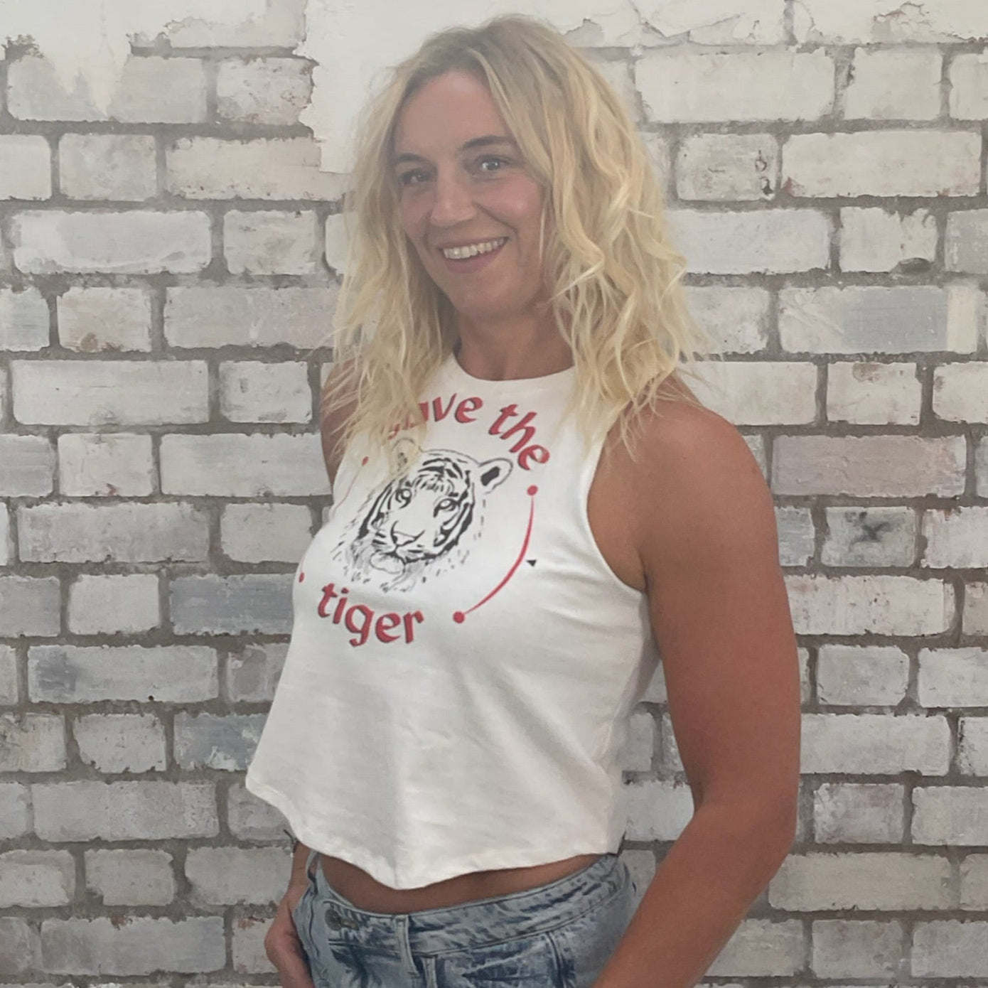 One-of-a-kind Save the Tiger World Wildlife Fund graphic Racerback Unwantee tank top side view, upcycled, sustainable, made in Britain