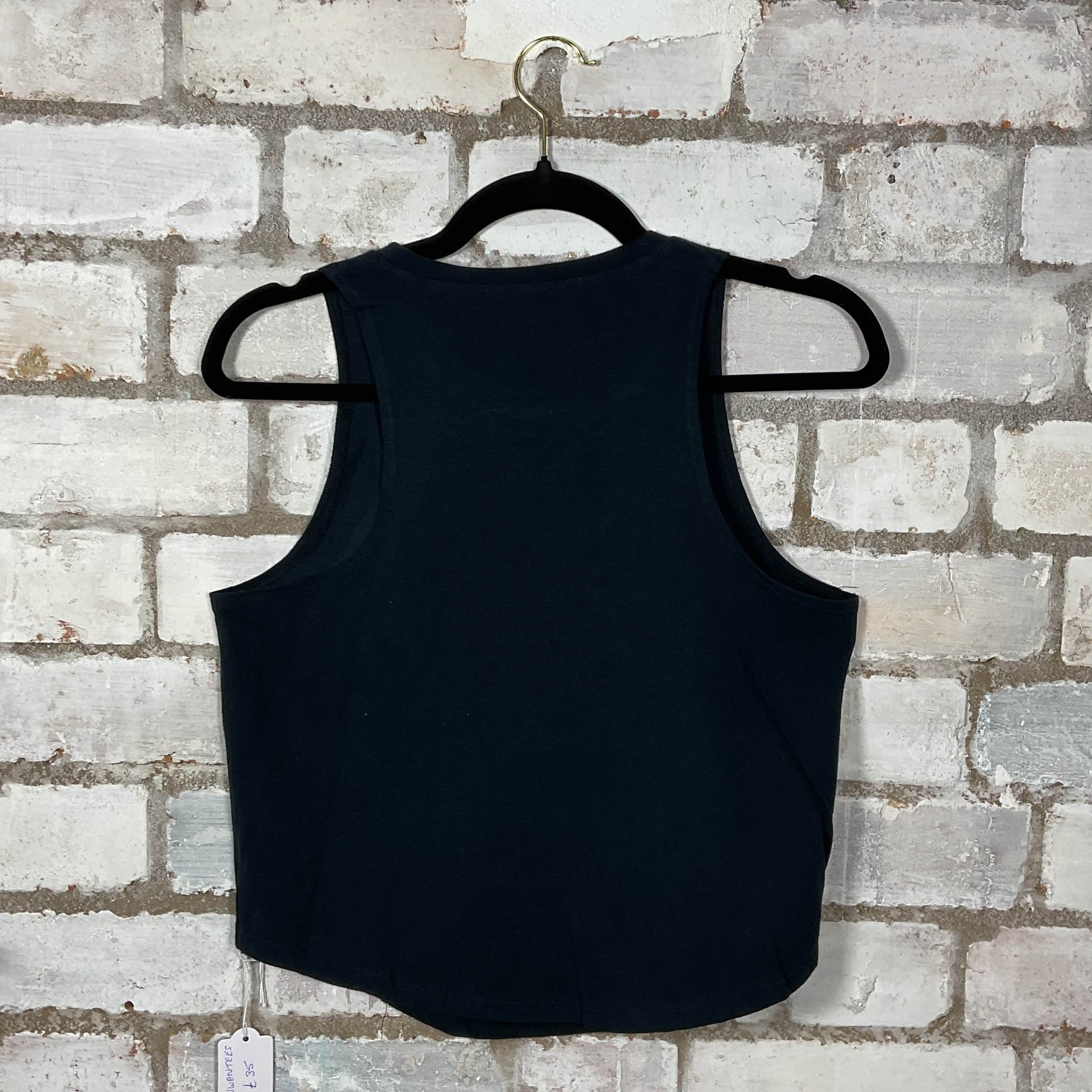 Back View of Metallica Graphic Print Racerback Unwantee Tank Top upcycled by Unwantees, sustainable fashion made in great Britain from vintage graphic tshirt 