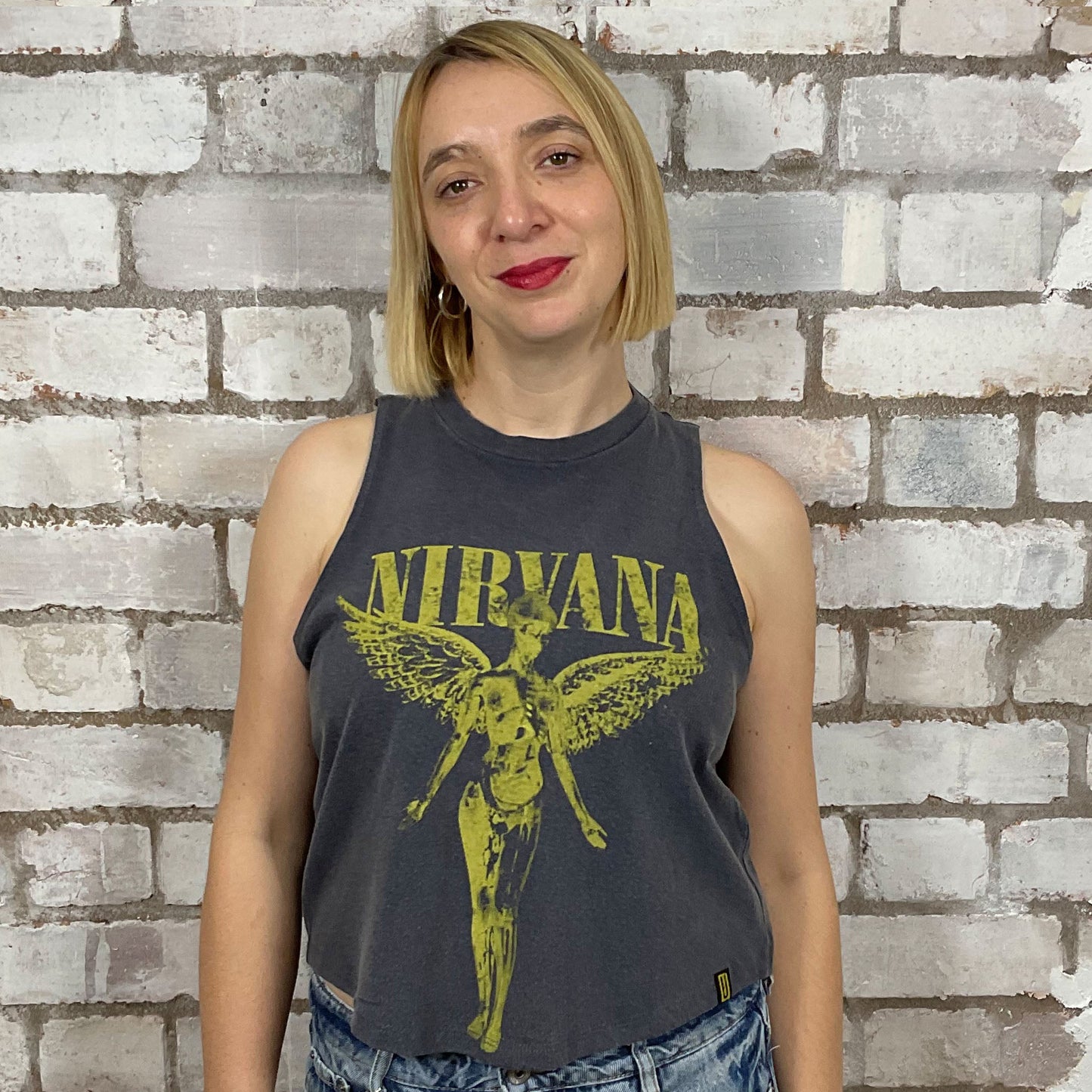 In Utero, Nirvana, Racerback tank in yellow graphic on faded grey T-shirt, top made from upcycled graphic band tshirt, punk rock style street wear, athleisure wear, unwantees is a sustainable fashion brand, we take unwanted graphic tshirts otherwise destined for landfill and recycle clothing into vest tops for sports wear or leisure.  Refashioned band merch, Slash Neck Sleeveless Top