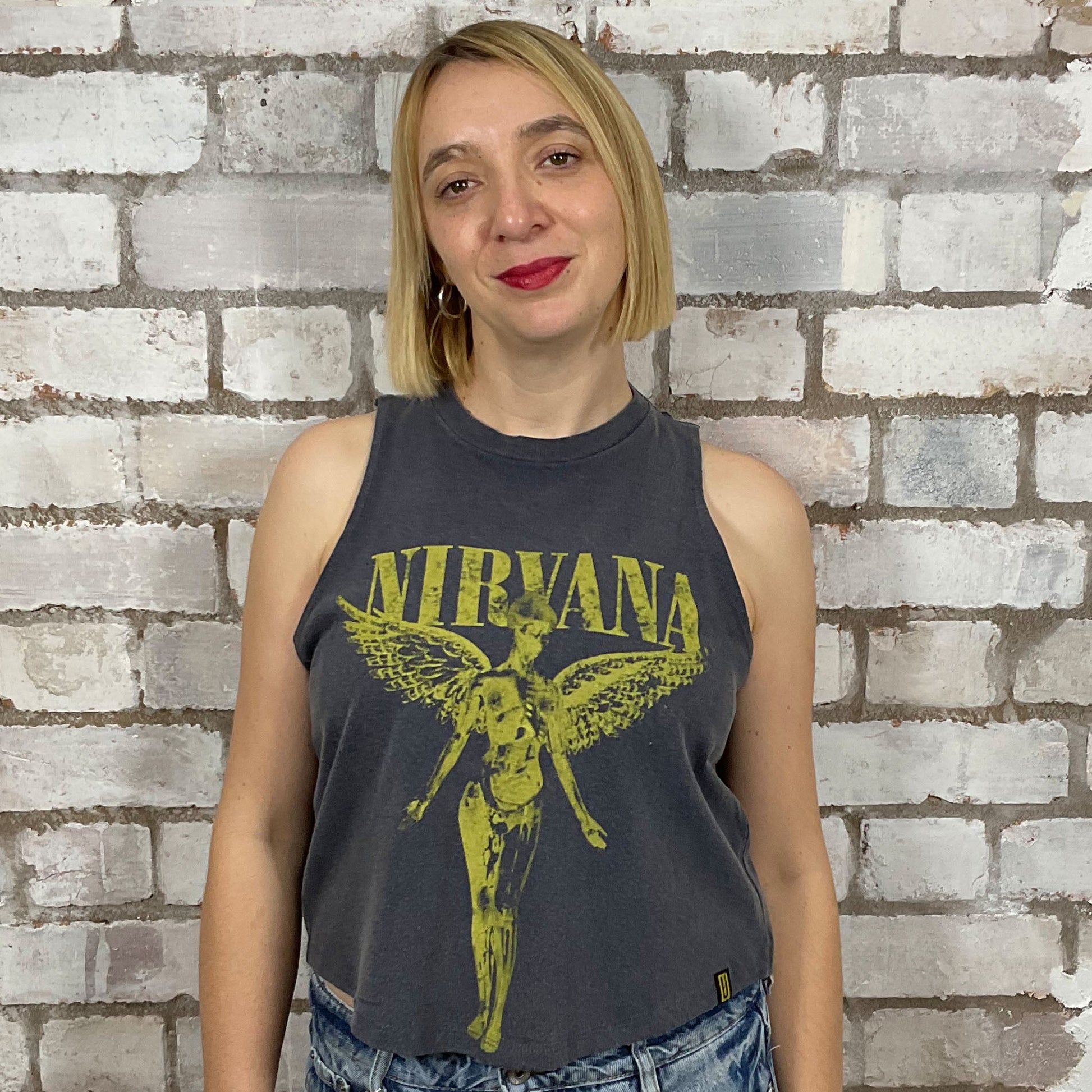 In Utero, Nirvana, Racerback tank in yellow graphic on faded grey T-shirt, top made from upcycled graphic band tshirt, punk rock style street wear, athleisure wear, unwantees is a sustainable fashion brand, we take unwanted graphic tshirts otherwise destined for landfill and recycle clothing into vest tops for sports wear or leisure.  Refashioned band merch, Slash Neck Sleeveless Top