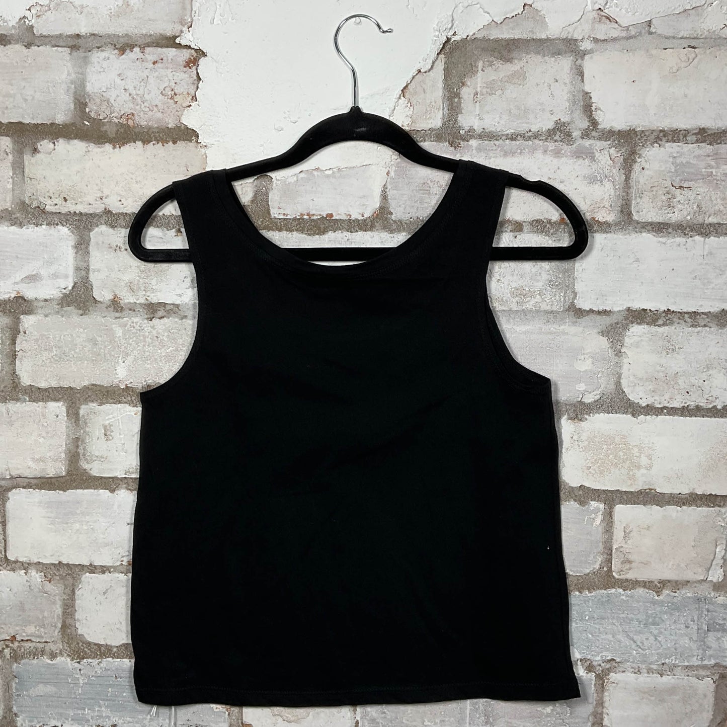 Rearview of Skindred band graphics on a black cotton Scoop neck Vest Top upcycled by Unwantees, sustainable fashion made in Great Britain from vintage graphic tshirt 
