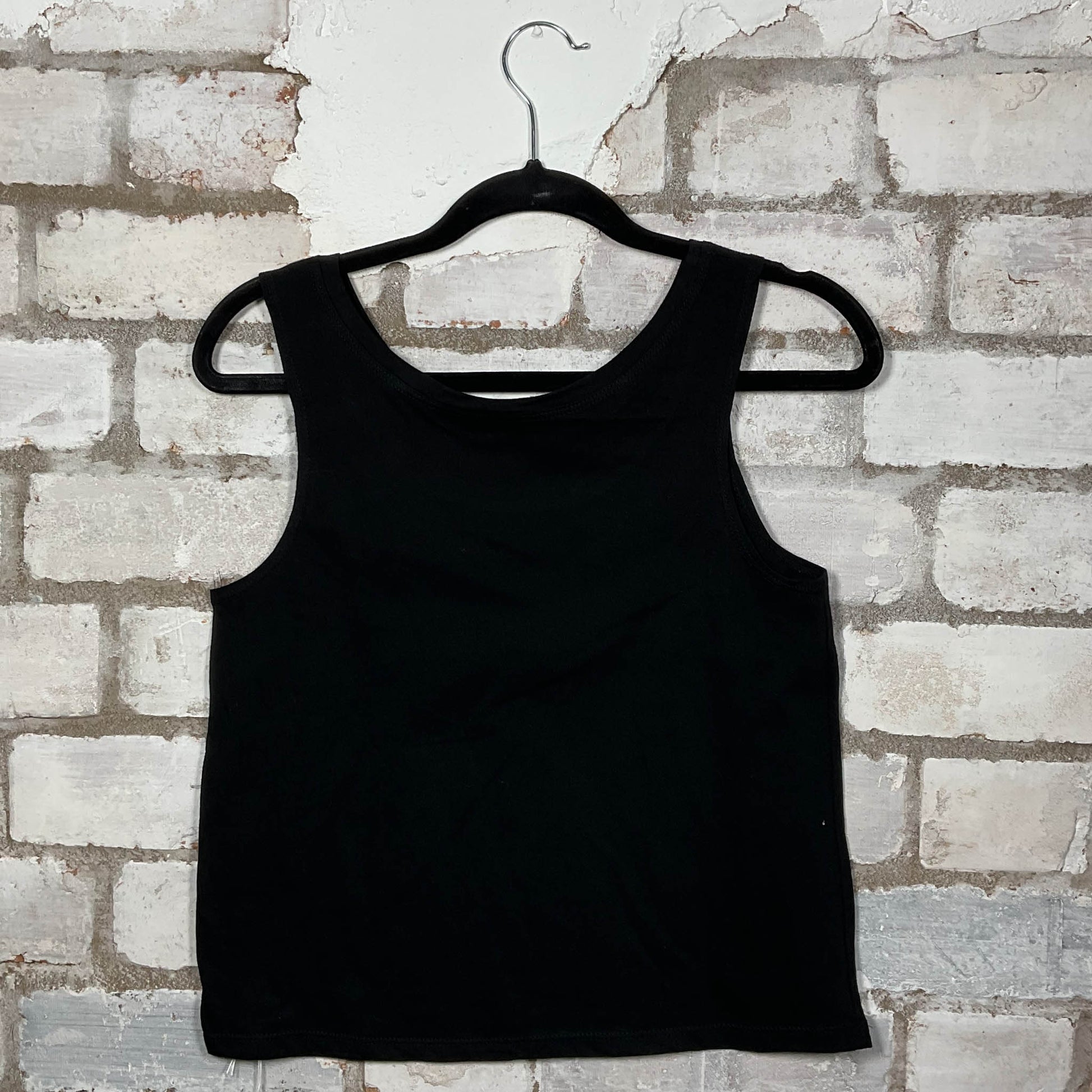 Rearview of Skindred band graphics on a black cotton Scoop neck Vest Top upcycled by Unwantees, sustainable fashion made in Great Britain from vintage graphic tshirt 