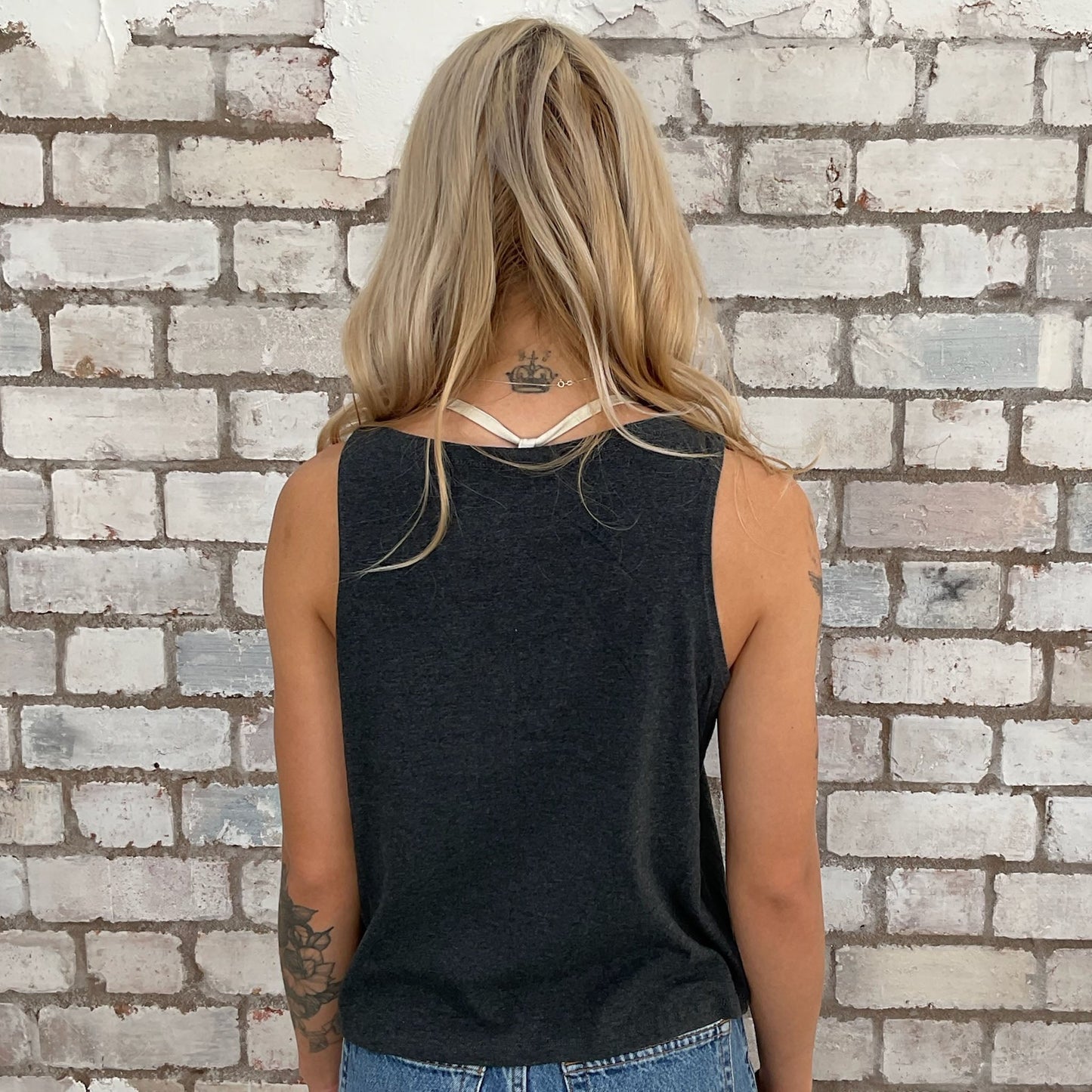 Graphic tshirt upcycled by Unwantees recycled tshirt otherwise destined for landfill.  Graphic tshirt recycled into sleeveless vest top, sustainable upcycled fashion, British recycled grunge brand, slow fashion, Far from Saints Punk Rock music style graphic tshirt upcycled by Unwantees, Slash Neck tank top, upcycled in the UK by unwantees. Sustainable upcycled fashion