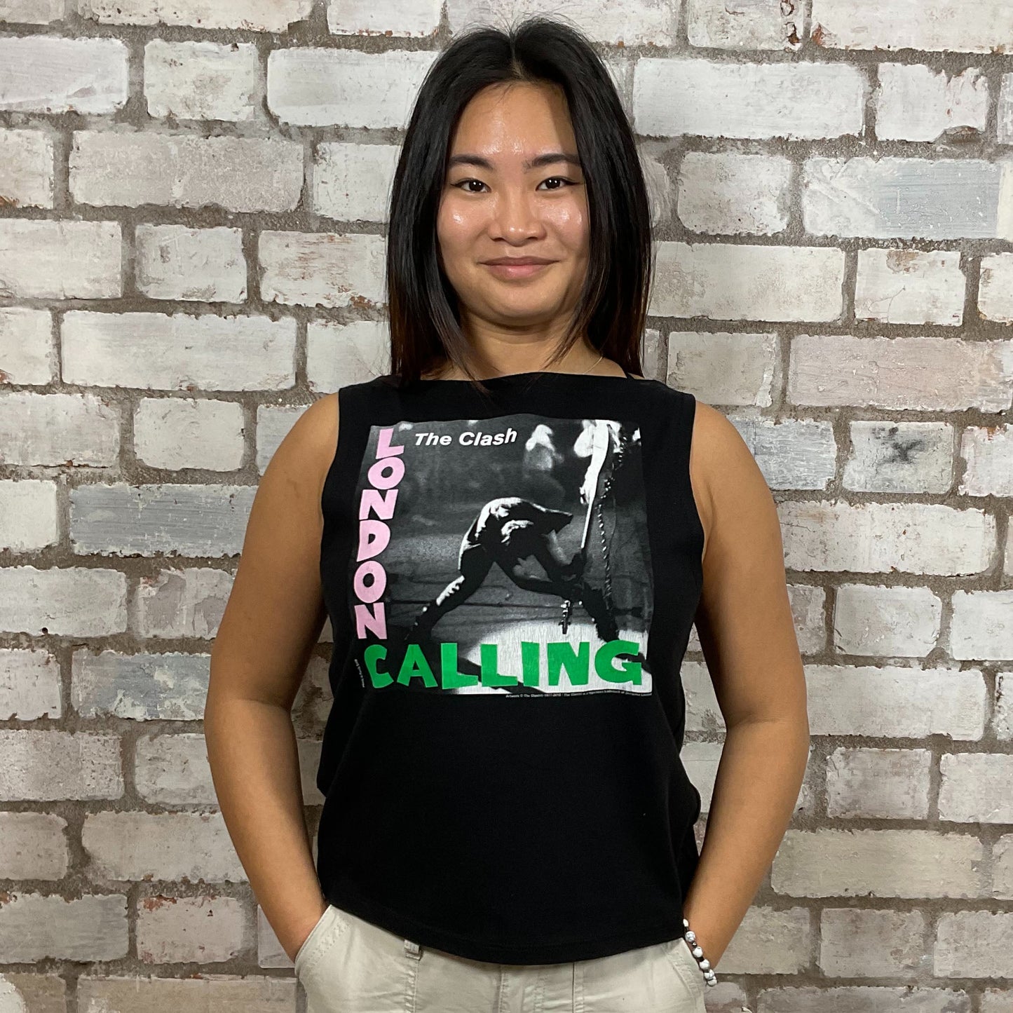 The Clash, London Calling graphic print!  100% cotton fabric, Unwantee made from upcycled and deconstructed graphic tshirt, punk rock style street wear, athleisure wear, unwantees is a sustainable fashion brand, we take unwanted graphic tshirts otherwise destined for landfill and recycle clothing into vest tops for sports wear or leisure.  Refashioned band merch, Slash Neck Sleeveless Top