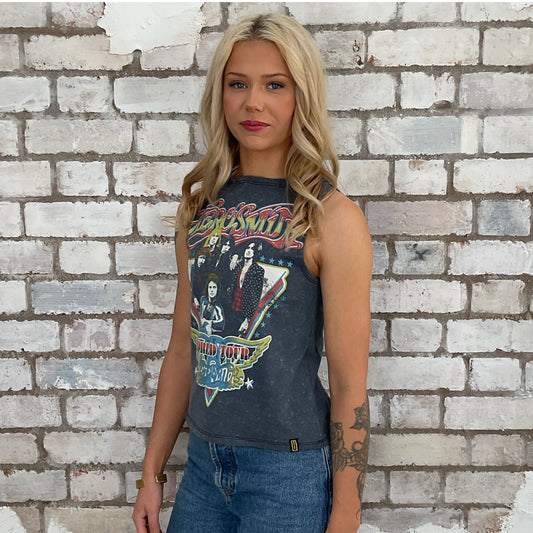 Aerosmith Graphic tshirt recycled into sleeveless vest top, sustainable upcycled fashion, British recycled grunge brand, slow fashion, Punk Rock music style graphic tshirt upcycled by Unwantees, Slash Neck tank top, upcycled in the UK by unwantees. Sustainable upcycled fashion.  World Tour band photo Graphic tshirt upcycled by Unwantees recycled tshirt otherwise destined for landfill.  