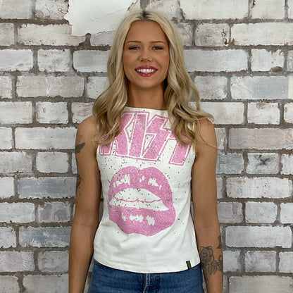 Pink Graphic KISS band tshirt recycled into sleeveless racerback vest top, sustainable upcycled fashion, British recycled grunge brand, slow fashion, Punk Rock music style graphic tshirt upcycled by Unwantees, upcycled in the UK by unwantees. Sustainable upcycled fashion. Graphic tshirt upcycled by Unwantees recycled tshirt otherwise destined for landfill.  