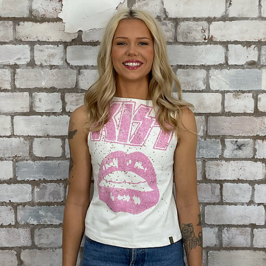 Pink Graphic KISS band tshirt recycled into sleeveless racerback vest top, sustainable upcycled fashion, British recycled grunge brand, slow fashion, Punk Rock music style graphic tshirt upcycled by Unwantees, upcycled in the UK by unwantees. Sustainable upcycled fashion. Graphic tshirt upcycled by Unwantees recycled tshirt otherwise destined for landfill.  