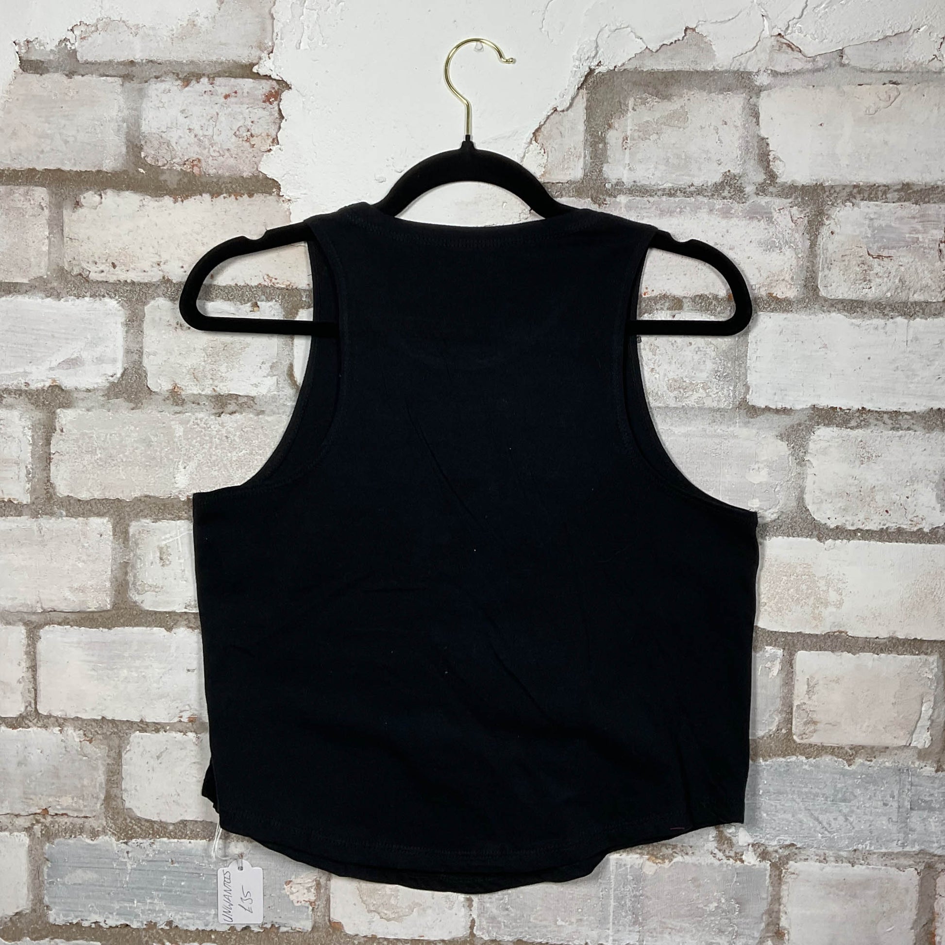 Rear view of Foo Fighters band graphics on a black cotton Racerback Tank Top upcycled by Unwantees, sustainable fashion made in Great Britain from vintage graphic tshirt 