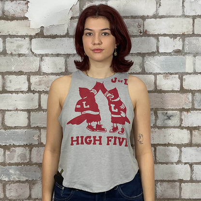 Woman wearing a gray tank top with red graphics and text against a brick wall.  Unwantees, upcycled graphic tshirts, recycled fashion by unwantees, ladies tank top