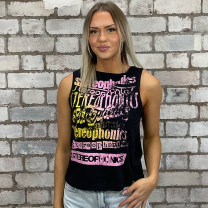 Stereophonics neon, vibrant print on black tshirt recycled into sleeveless Slash Neck vest top, sustainable upcycled fashion, British recycled grunge brand, slow fashion, Punk Rock music style graphic tshirt upcycled by Unwantees, tshirt upcycled in the UK by unwantees. Sustainable upcycled fashion. Graphic tshirt upcycled by Unwantees recycled tshirt otherwise destined for landfill.  