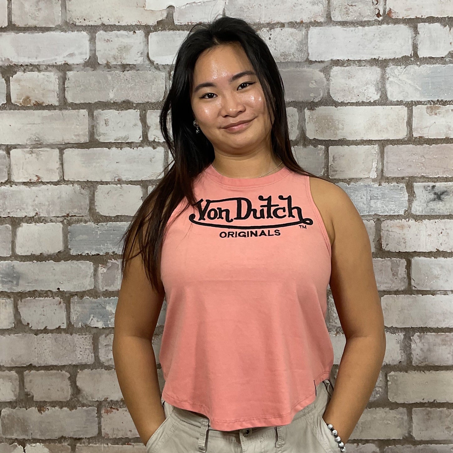 Von Dutch embroidery on peachy pink 100% cotton fabric, Unwantee made from upcycled and deconstructed graphic tshirt, punk rock style street wear, athleisure wear, unwantees is a sustainable fashion brand, we take unwanted graphic tshirts otherwise destined for landfill and recycle clothing into vest tops for sports wear or leisure.  Refashioned band merch, Slash Neck Sleeveless Top