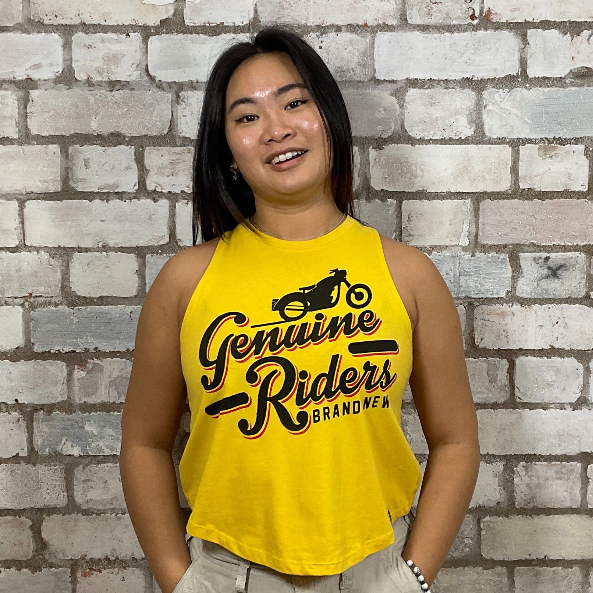 Genuine Rider graphic print on 100% golden yellow cotton fabric, Unwantee made from upcycled and deconstructed graphic tshirt, punk rock style street wear, athleisure wear, unwantees is a sustainable fashion brand, we take unwanted graphic tshirts otherwise destined for landfill and recycle clothing into vest tops for sports wear or leisure.  Refashioned band merch, Slash Neck Sleeveless Top