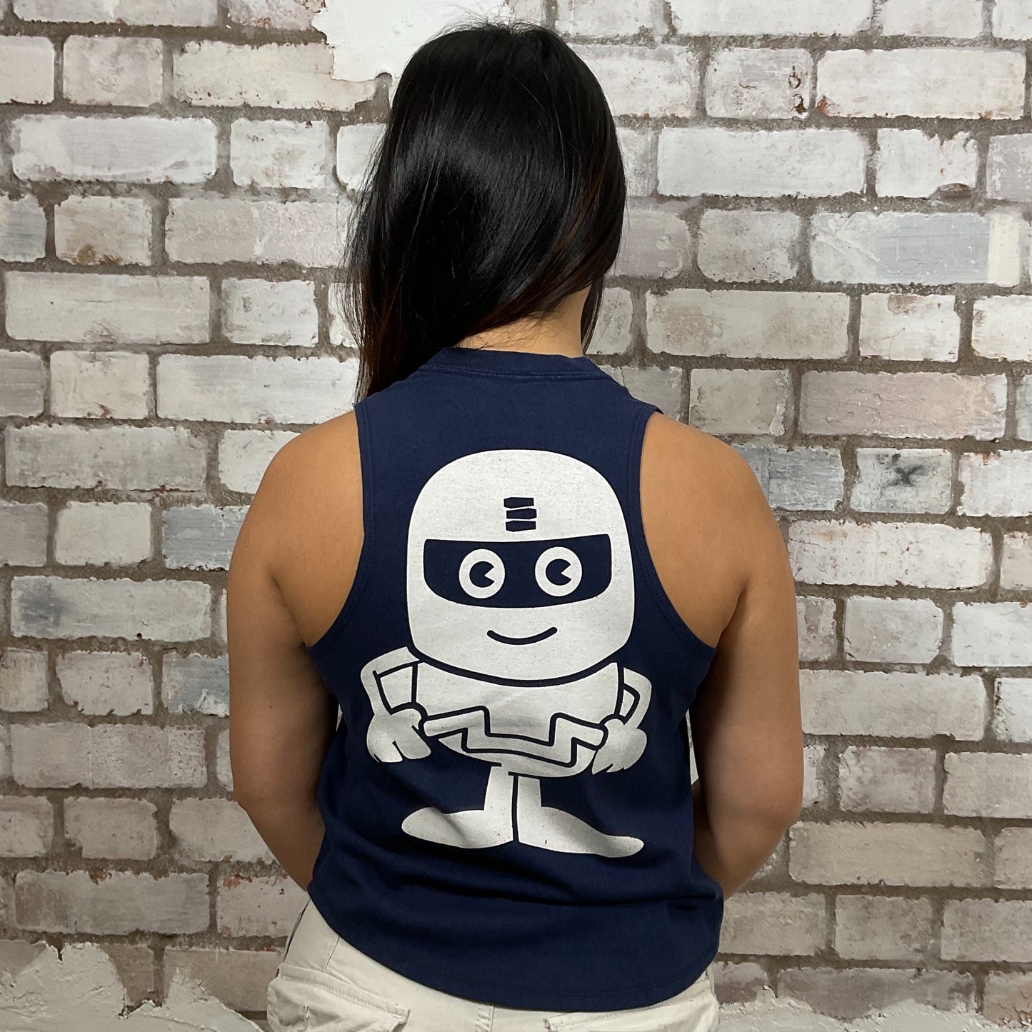 DSC Robot graphic print on 100% blue cotton fabric, Unwantee made from upcycled and deconstructed graphic tshirt, punk rock style street wear, athleisure wear, unwantees is a sustainable fashion brand, we take unwanted graphic tshirts otherwise destined for landfill and recycle clothing into vest tops for sports wear or leisure.  Refashioned band merch, Slash Neck Sleeveless Top