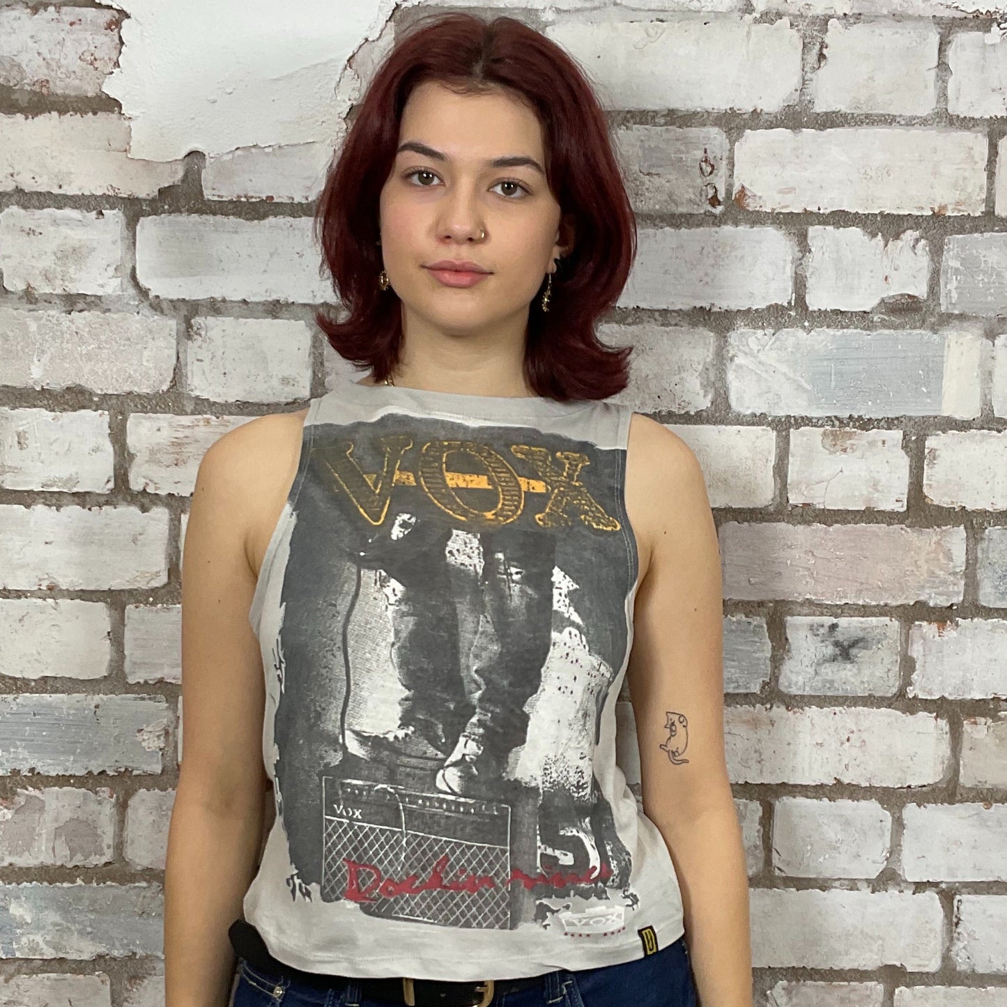 VOX Amplifier distressed Graphic print, Unwantee made from upcycled and deconstructed graphic tshirt, punk rock style street wear, athleisure wear, unwantees is a sustainable fashion brand, we take unwanted graphic tshirts otherwise destined for landfill and recycle clothing into vest tops for sports wear or leisure.  Refashioned band merch, Slash Neck Sleeveless Top