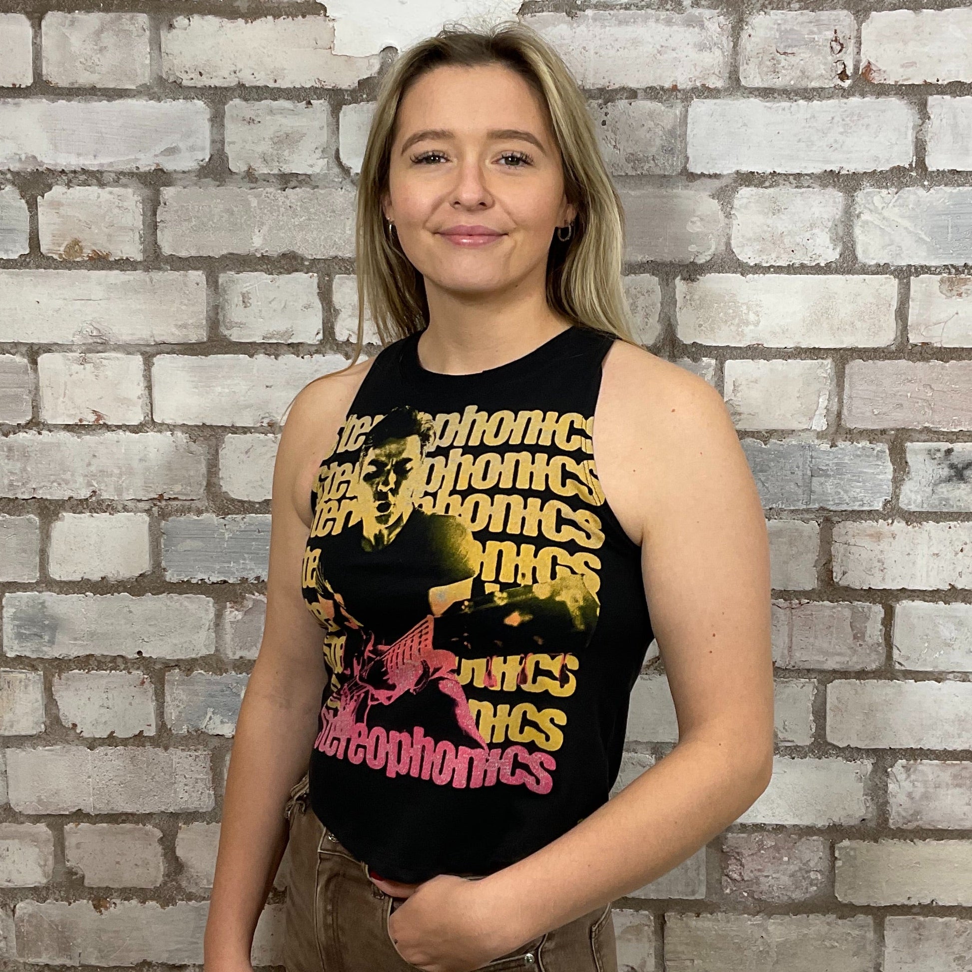 Stereophonics Neon Graphic print, Festival Style Unwantee made from upcycled and deconstructed graphic tshirt, punk rock style street wear, athleisure wear, unwantees is a sustainable fashion brand, we take unwanted graphic tshirts otherwise destined for landfill and recycle clothing into vest tops for sports wear or leisure.  Refashioned band merch, Slash Neck Sleeveless Top